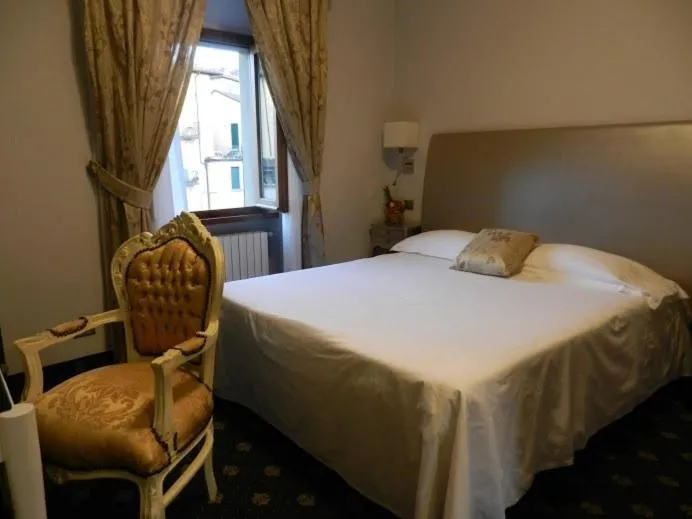 Bedroom in Sangallo Hotel