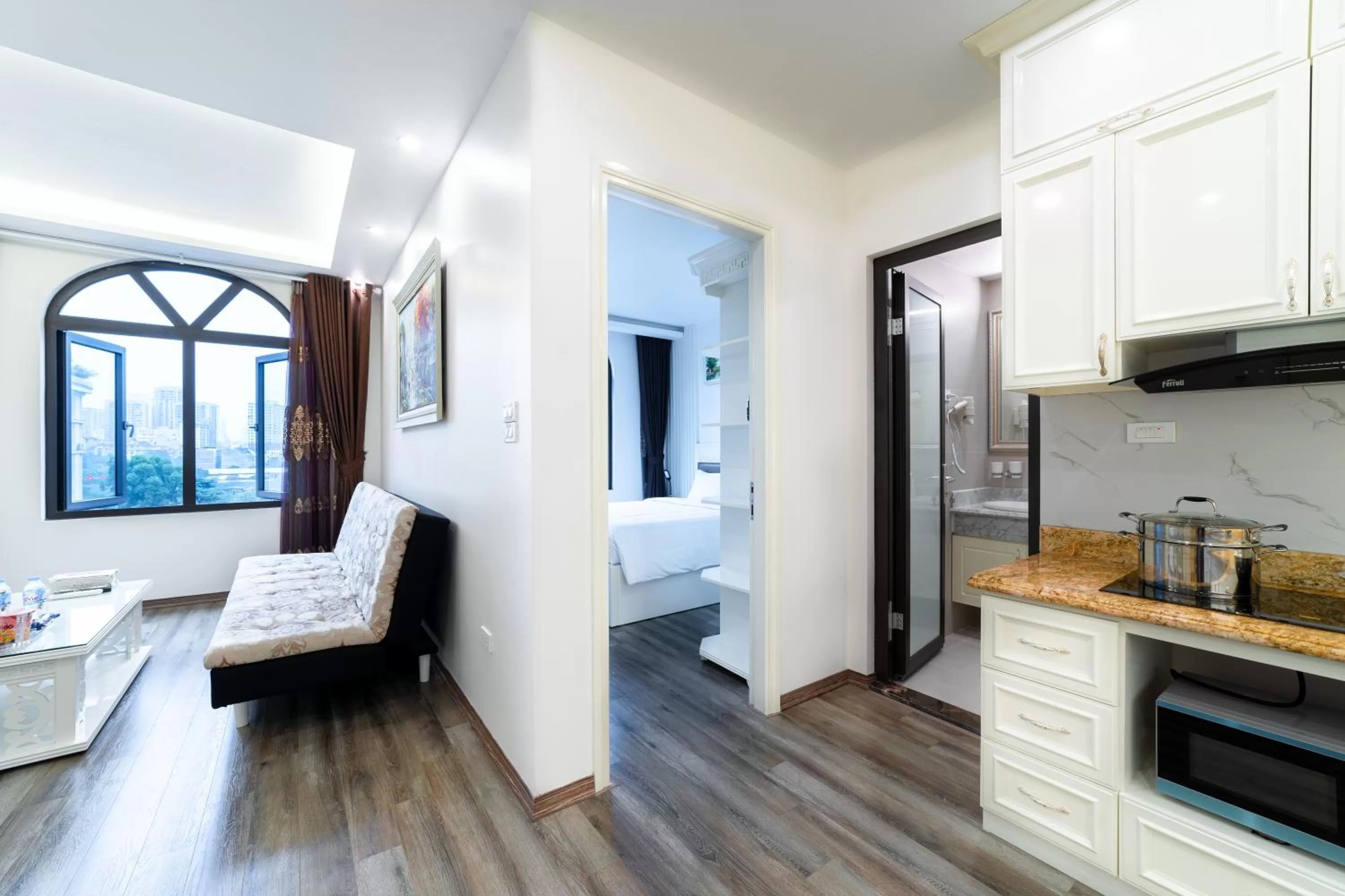 Living room, Bed in Rosee Apartment Hotel