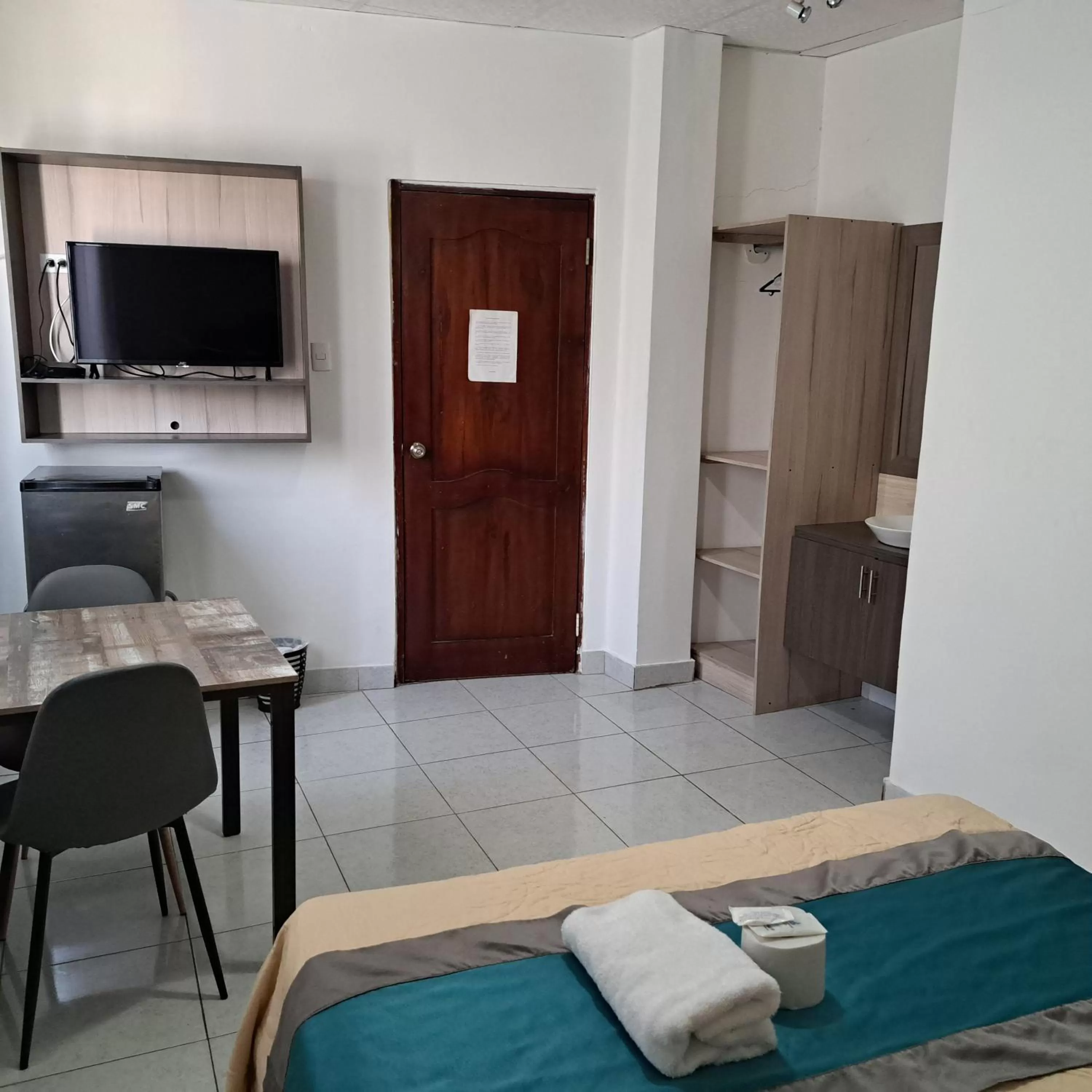 Photo of the whole room, TV/Entertainment Center in Atlantic Suites Hotel