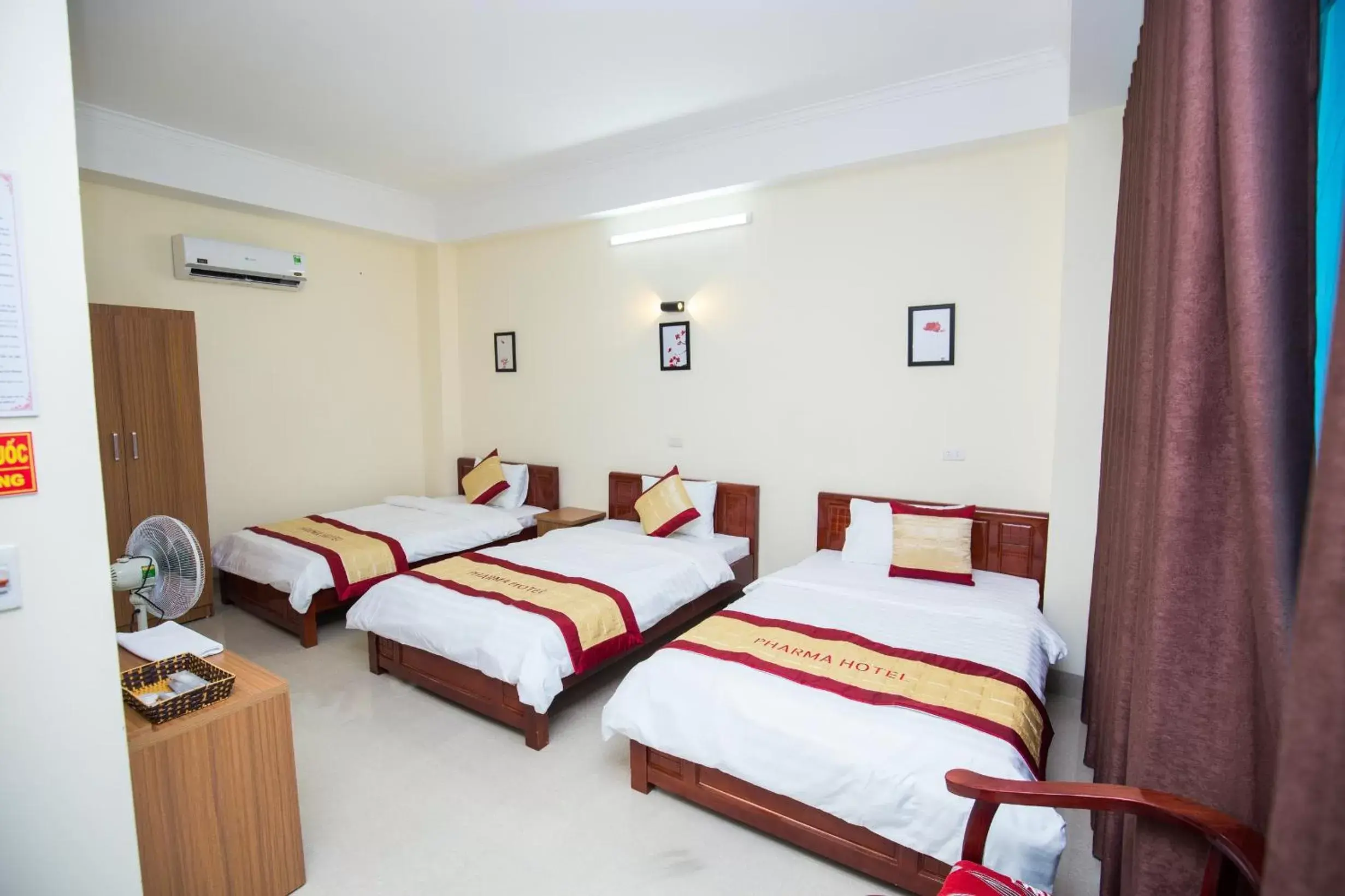 Basic Triple Room in Pharma Hotel Basic Triple Room in Pharma Hotel