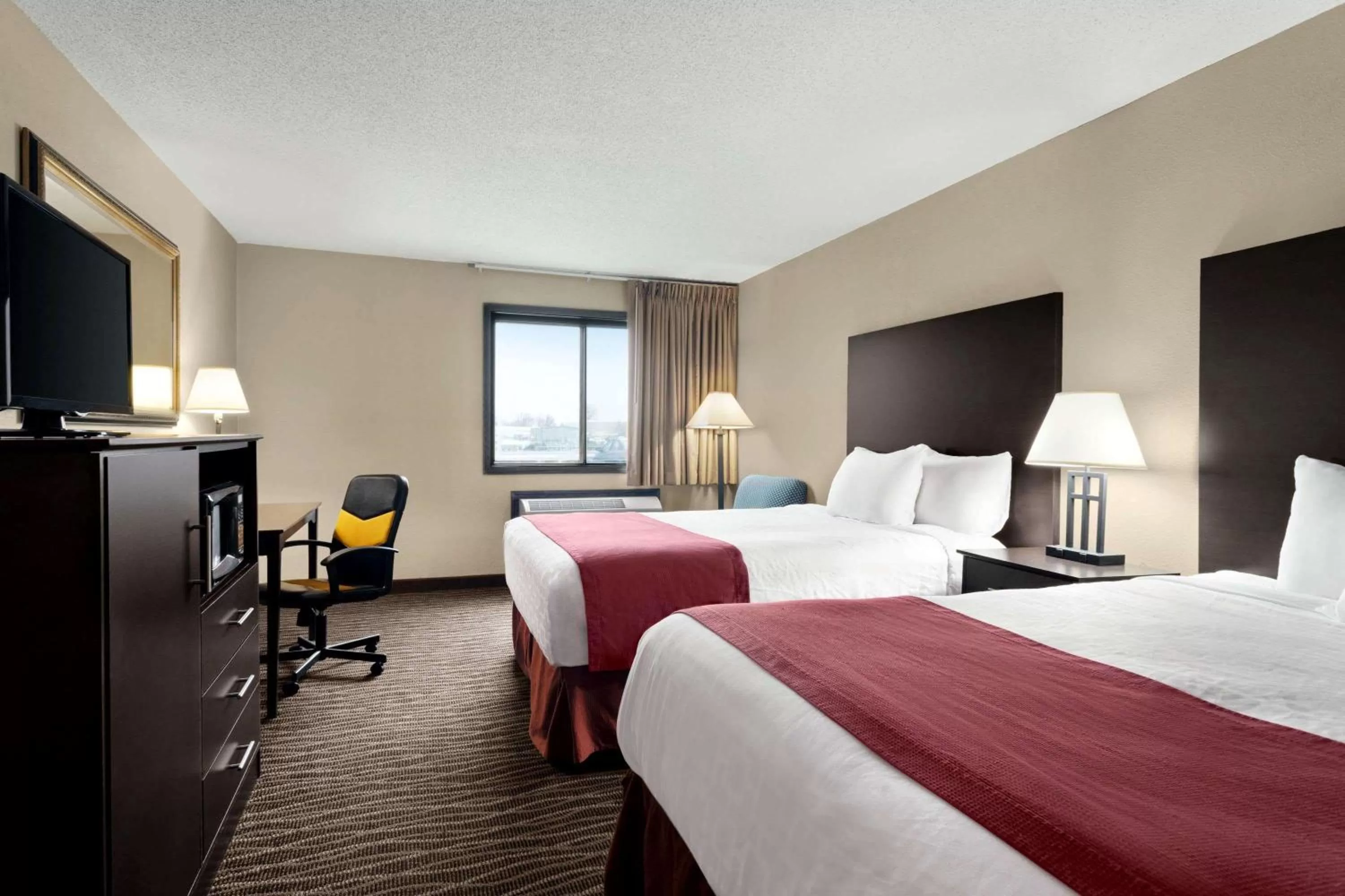 Photo of the whole room, Bed in Baymont by Wyndham Sioux Falls North,I-29,Russell St, Airport