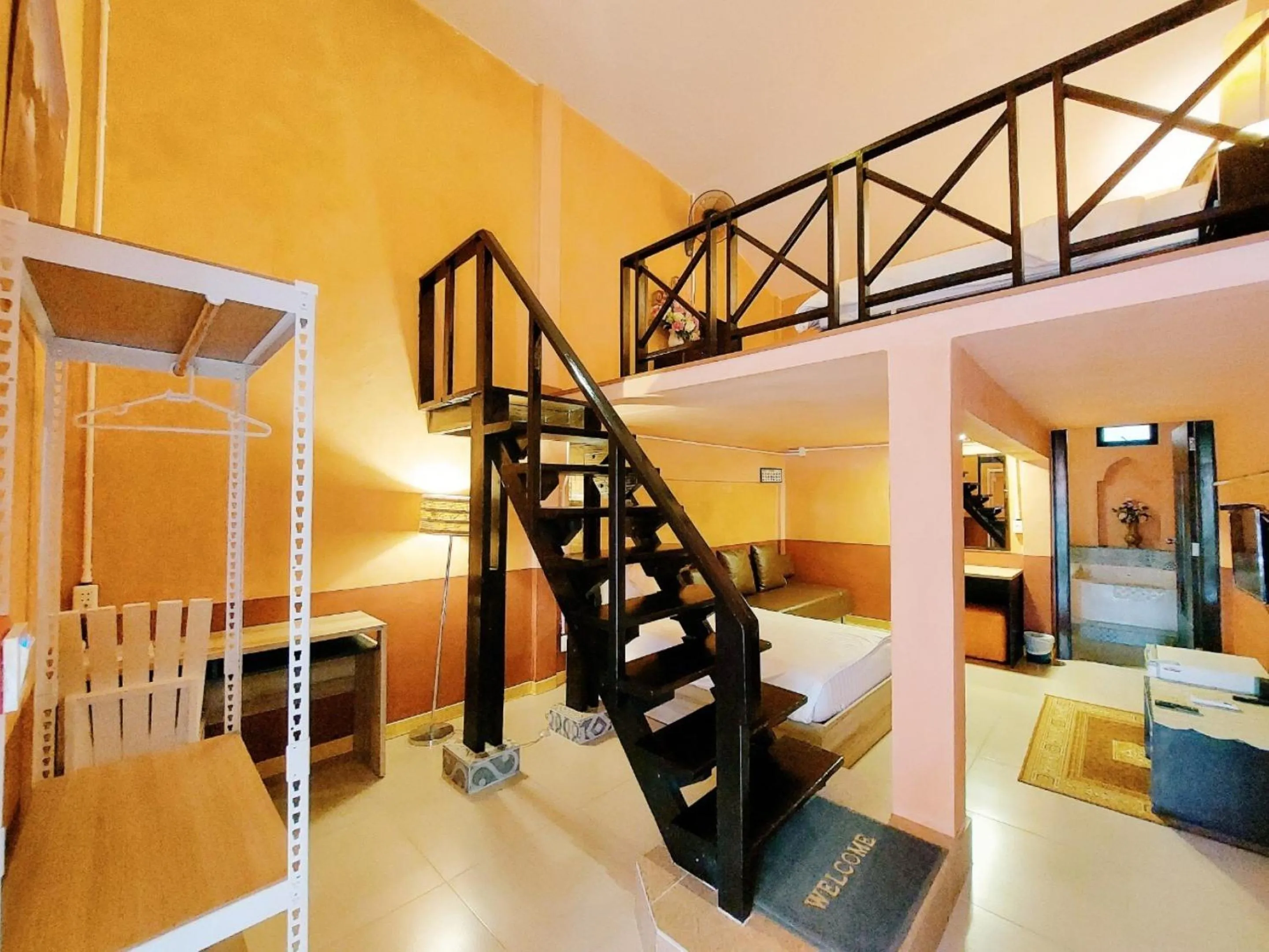 Photo of the whole room in Retro Box Hotel Chumphon