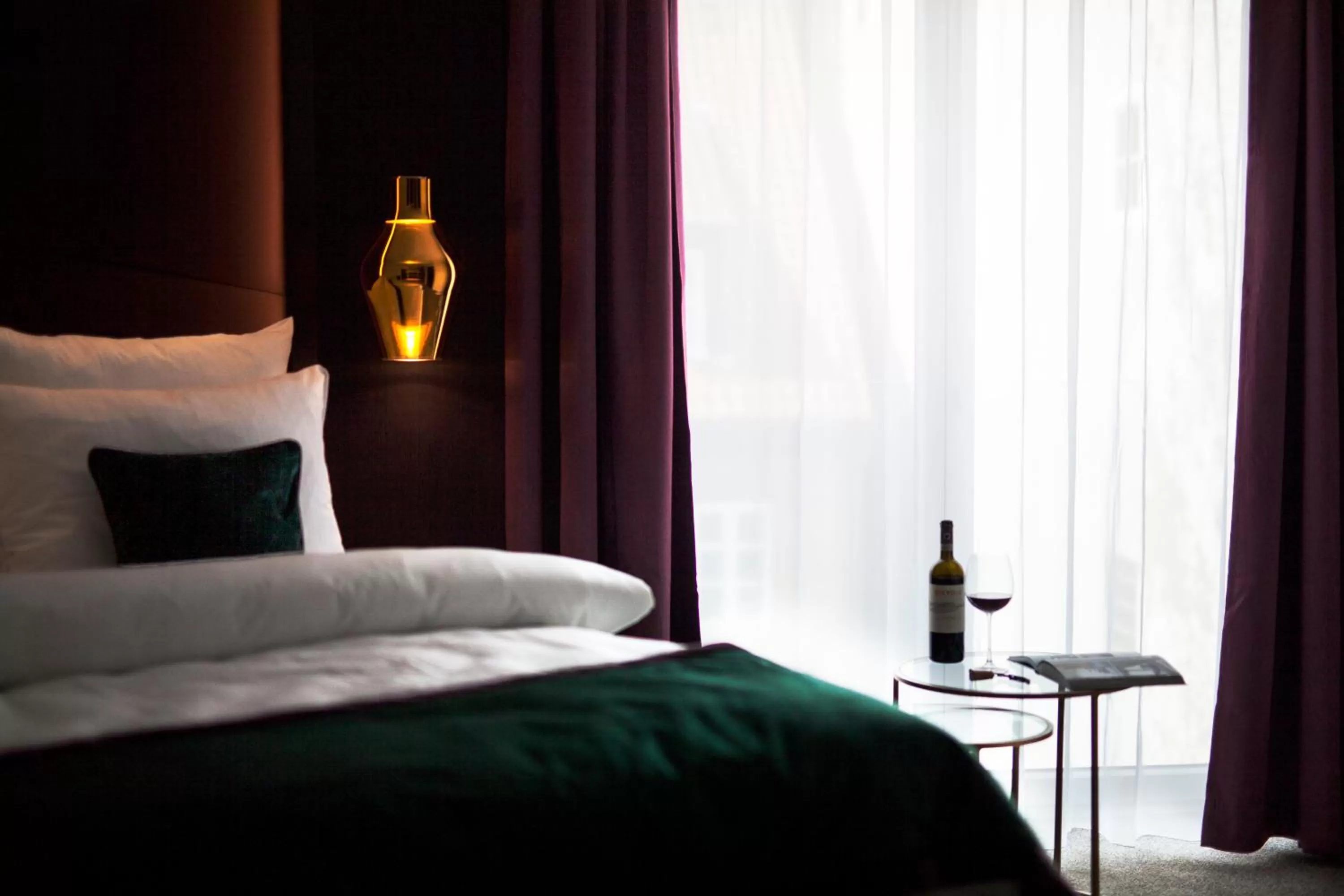 Bed in ONNO Boutique Hotel & Apartments