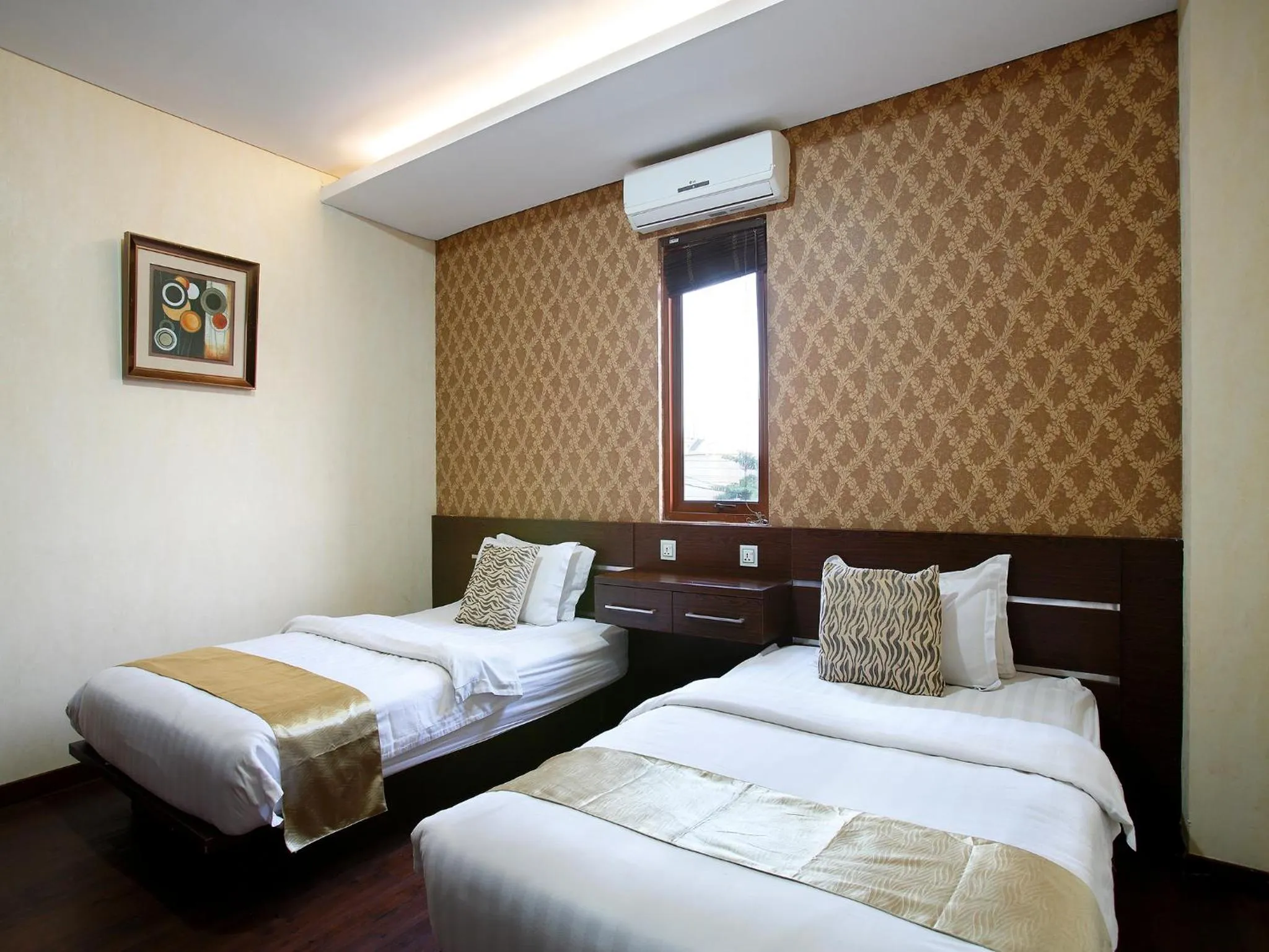 Bed in Devata Suites and Residence