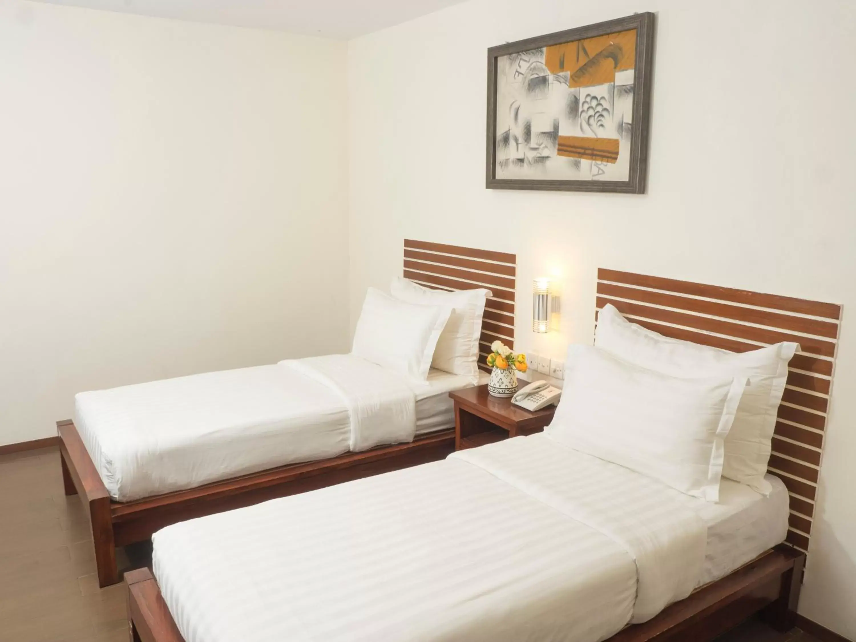 Twin Room with Shared Toilet in d'primahotel Melawai - Blok M Twin Room with Shared Toilet in d'primahotel Melawai - Blok M