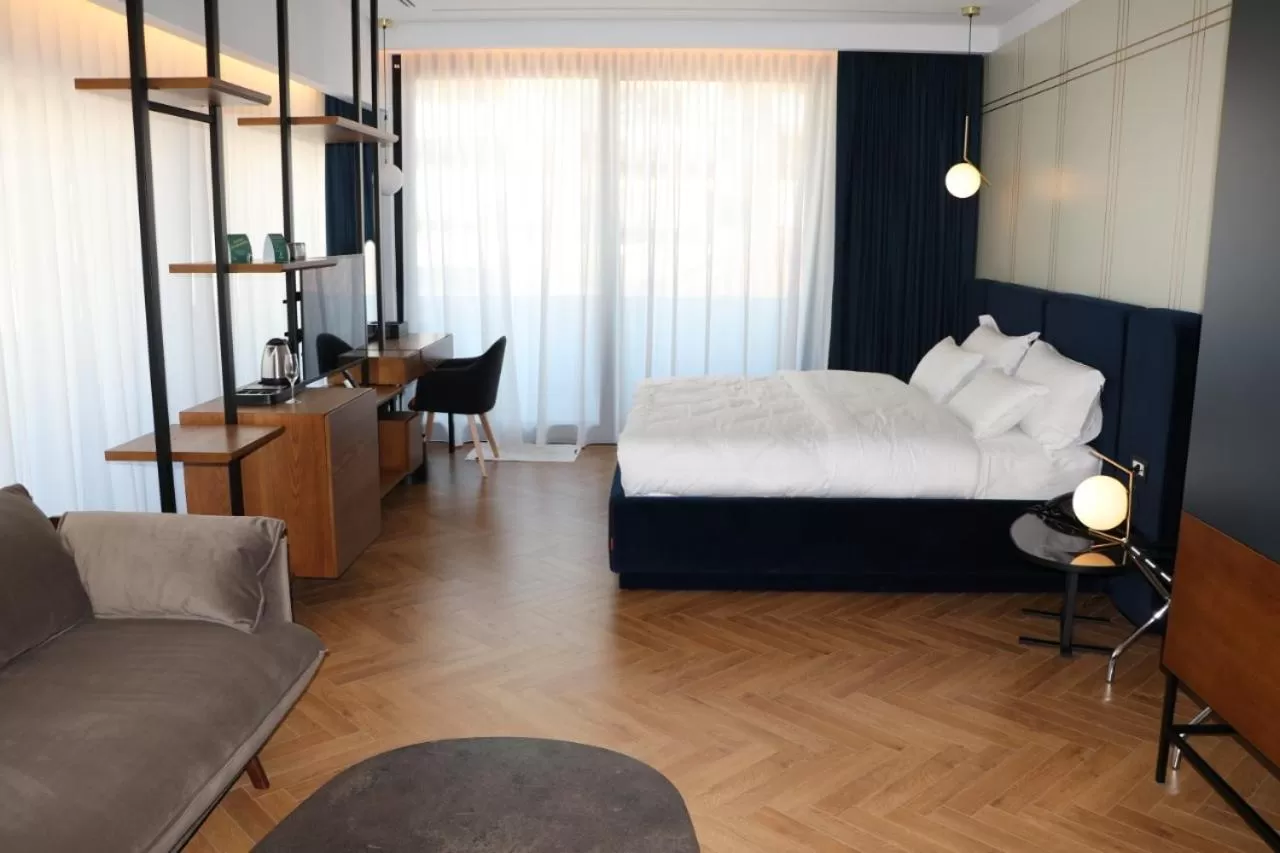 Bed in Moncafe BoutiqueHotel Spa