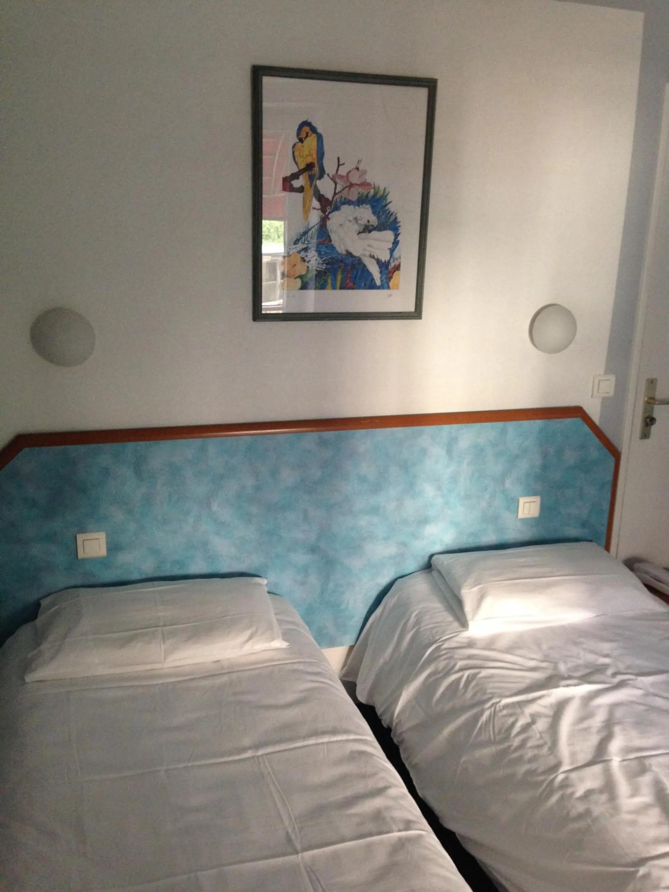 Bed in Hotel Royal Mansart