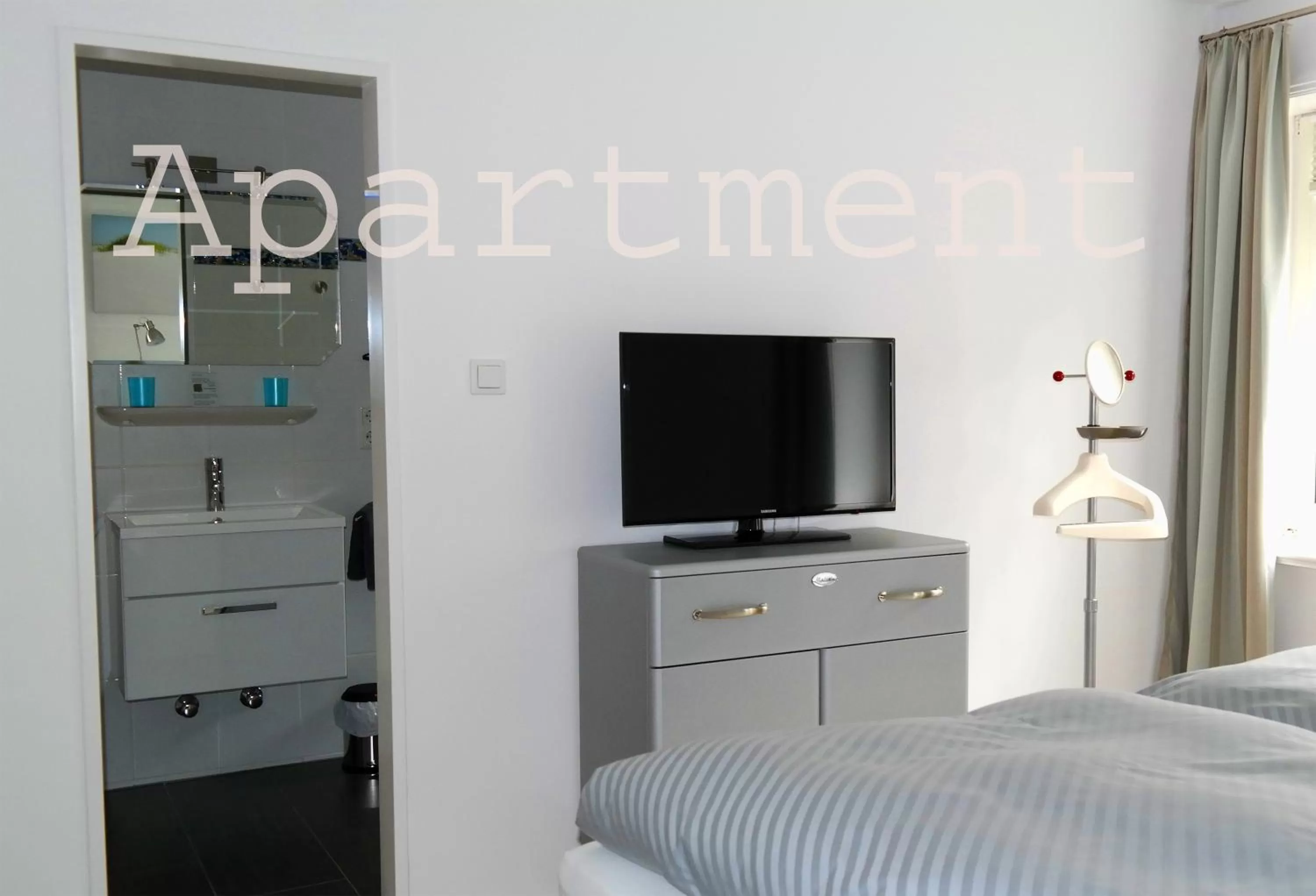 Decorative detail, TV/Entertainment Center in Duus Hotel garni