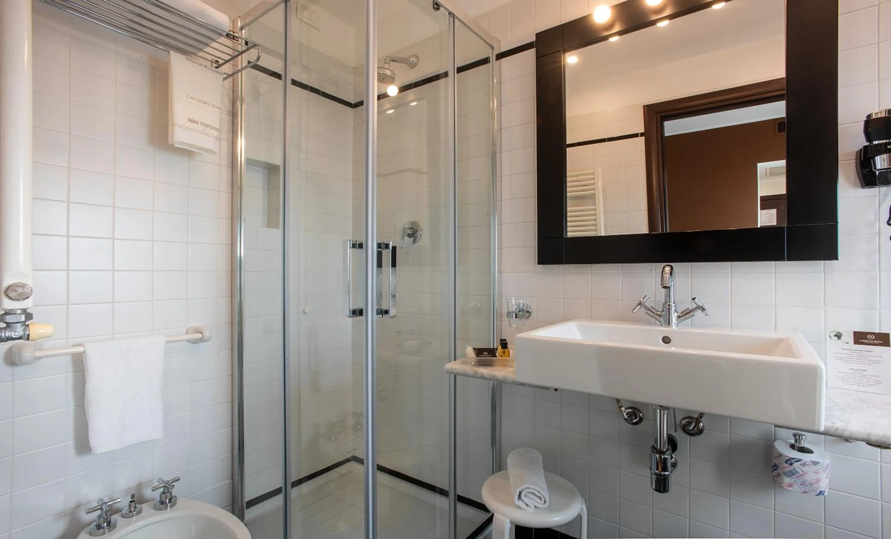 Bathroom in Sardegna Hotel - Suites & Restaurant