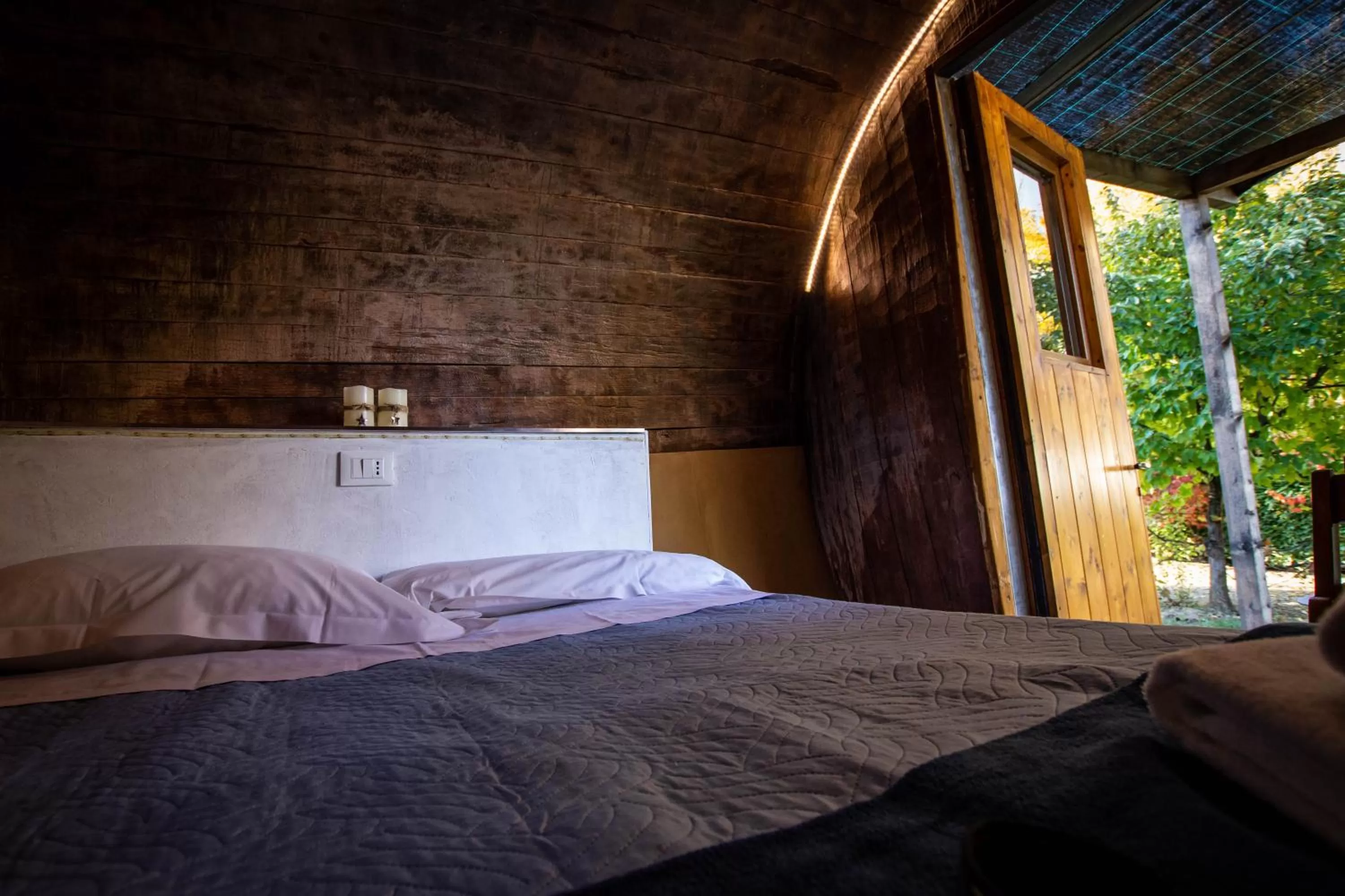 Bed in Albavillage Rooms & Camping