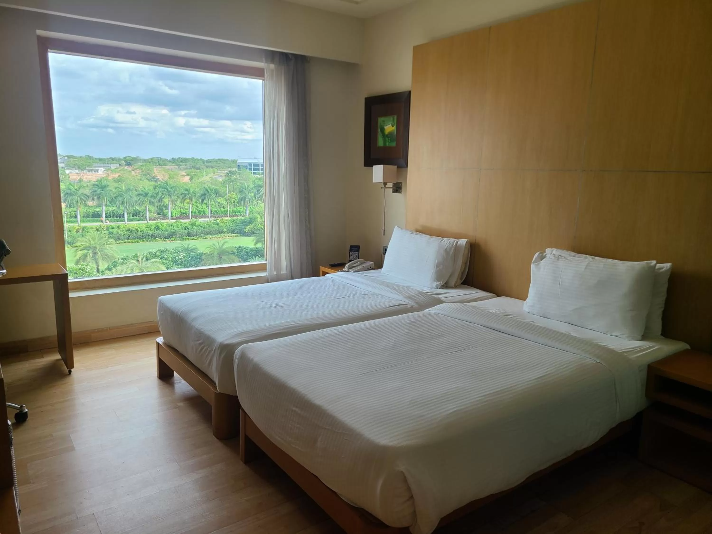 Seating area, Bed in Novotel Hyderabad Airport