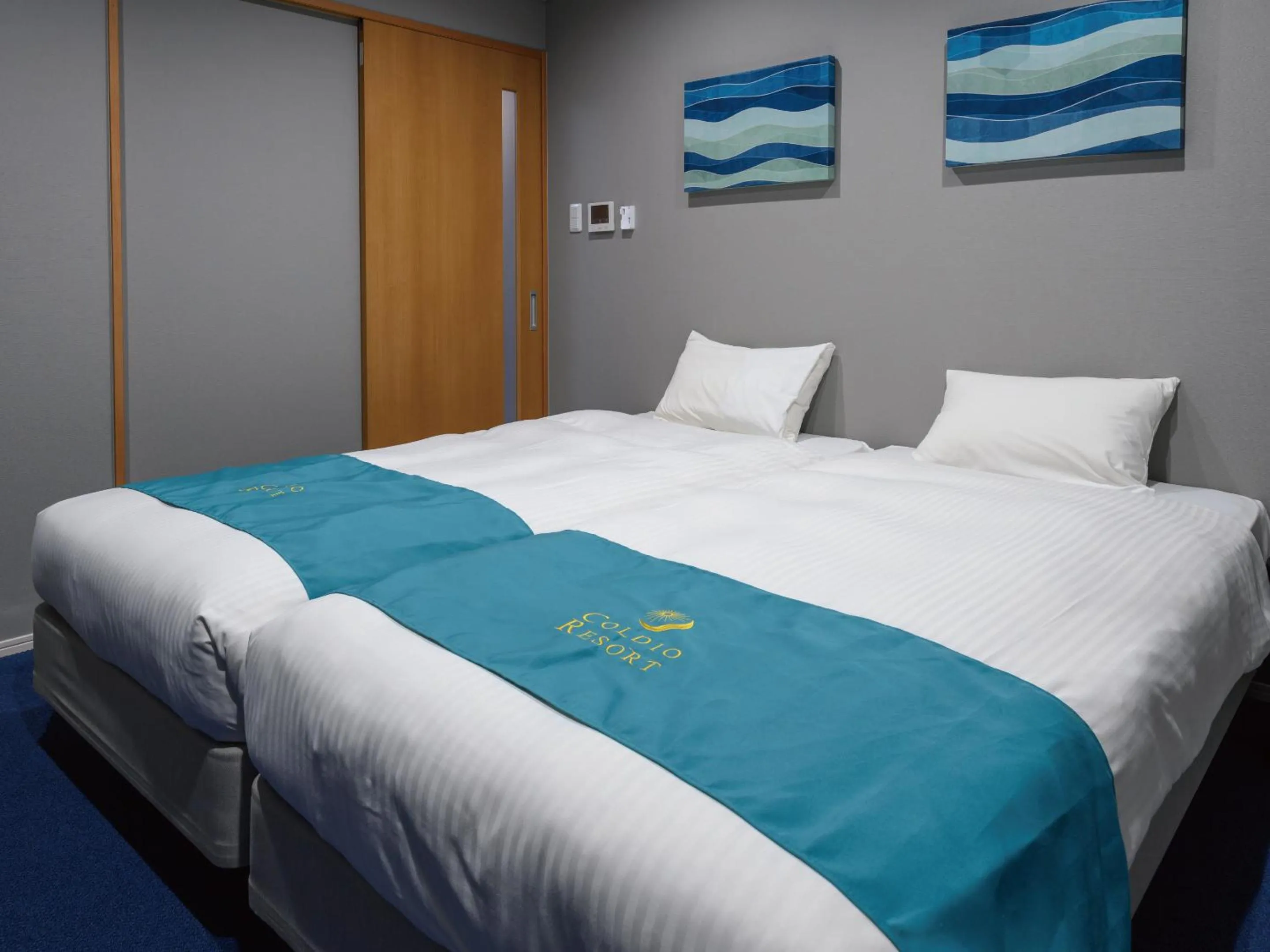 Bed in Condominium L's INN