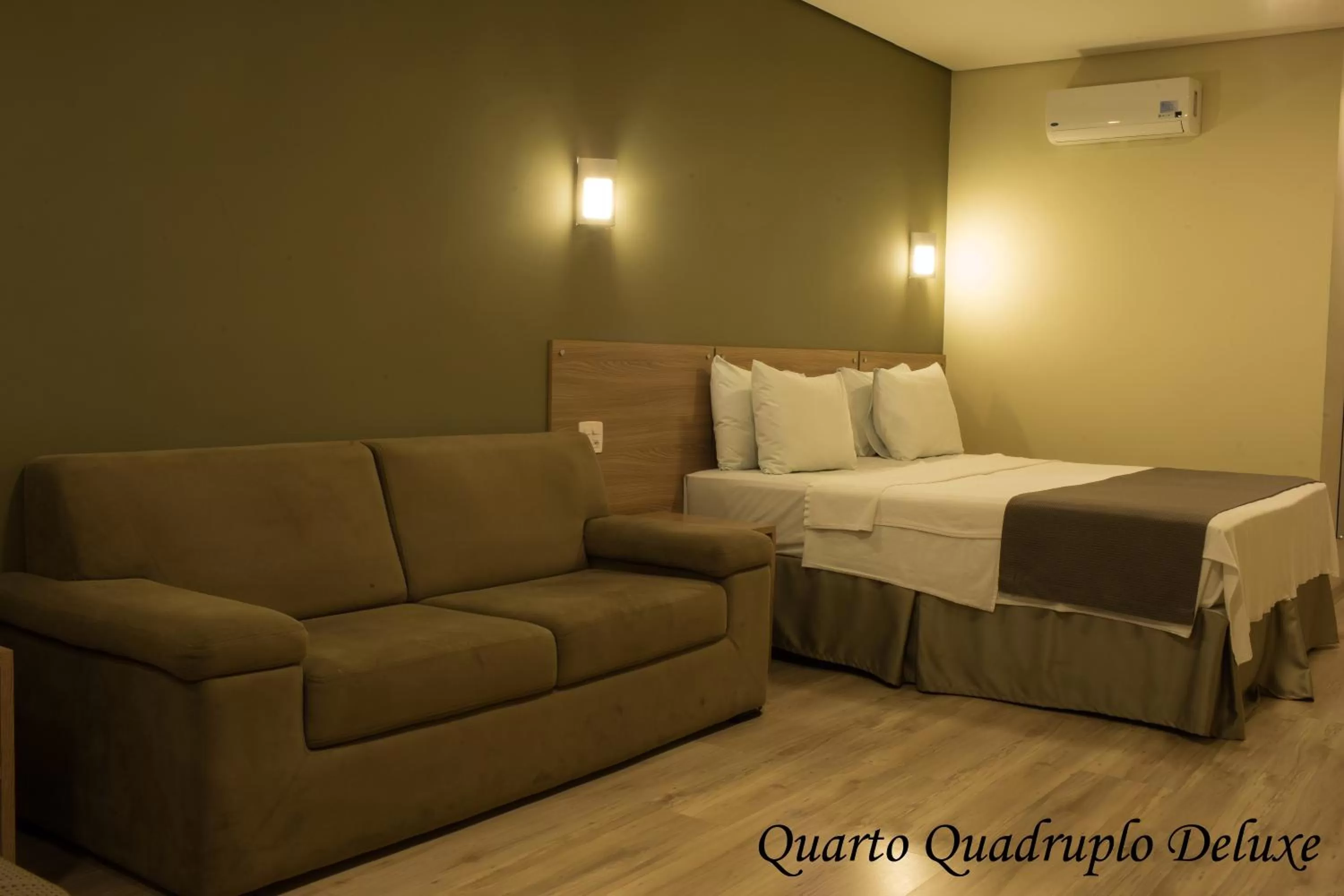 Bed in Minas Platinum Hotel & Convention