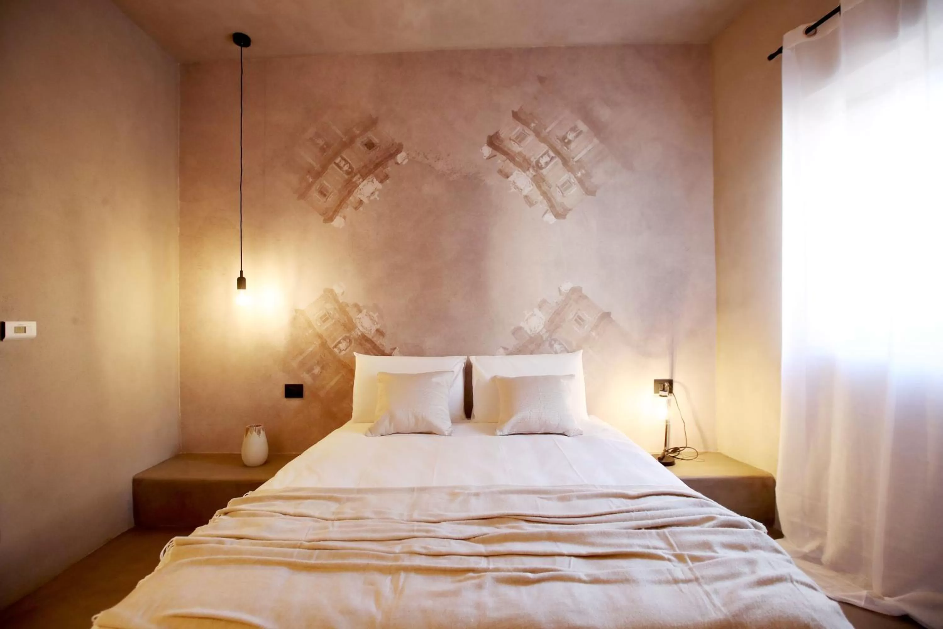 Bed in Casa Nostra Luxury Suites & Spa