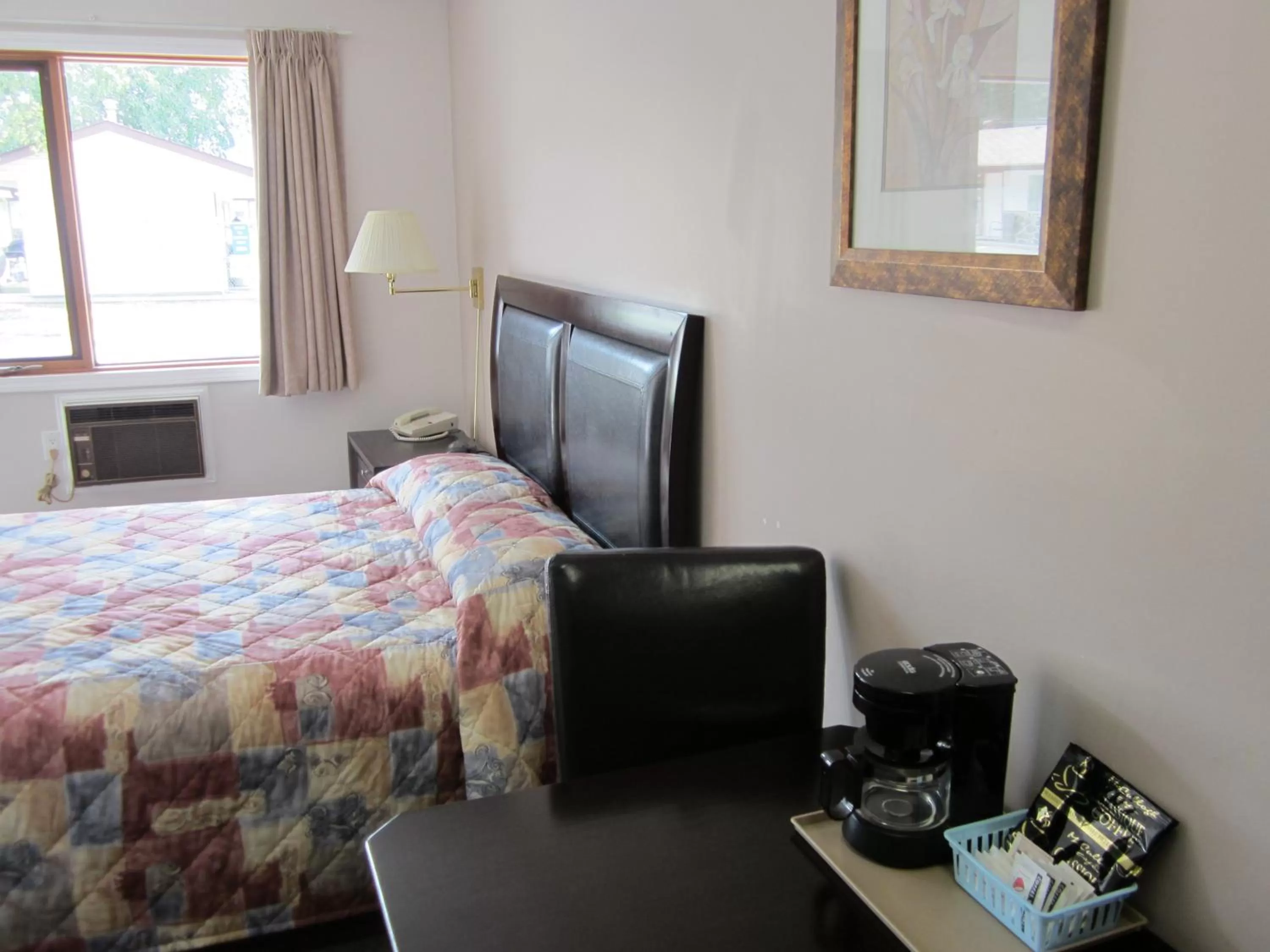 Bed in Monte Carlo Motel