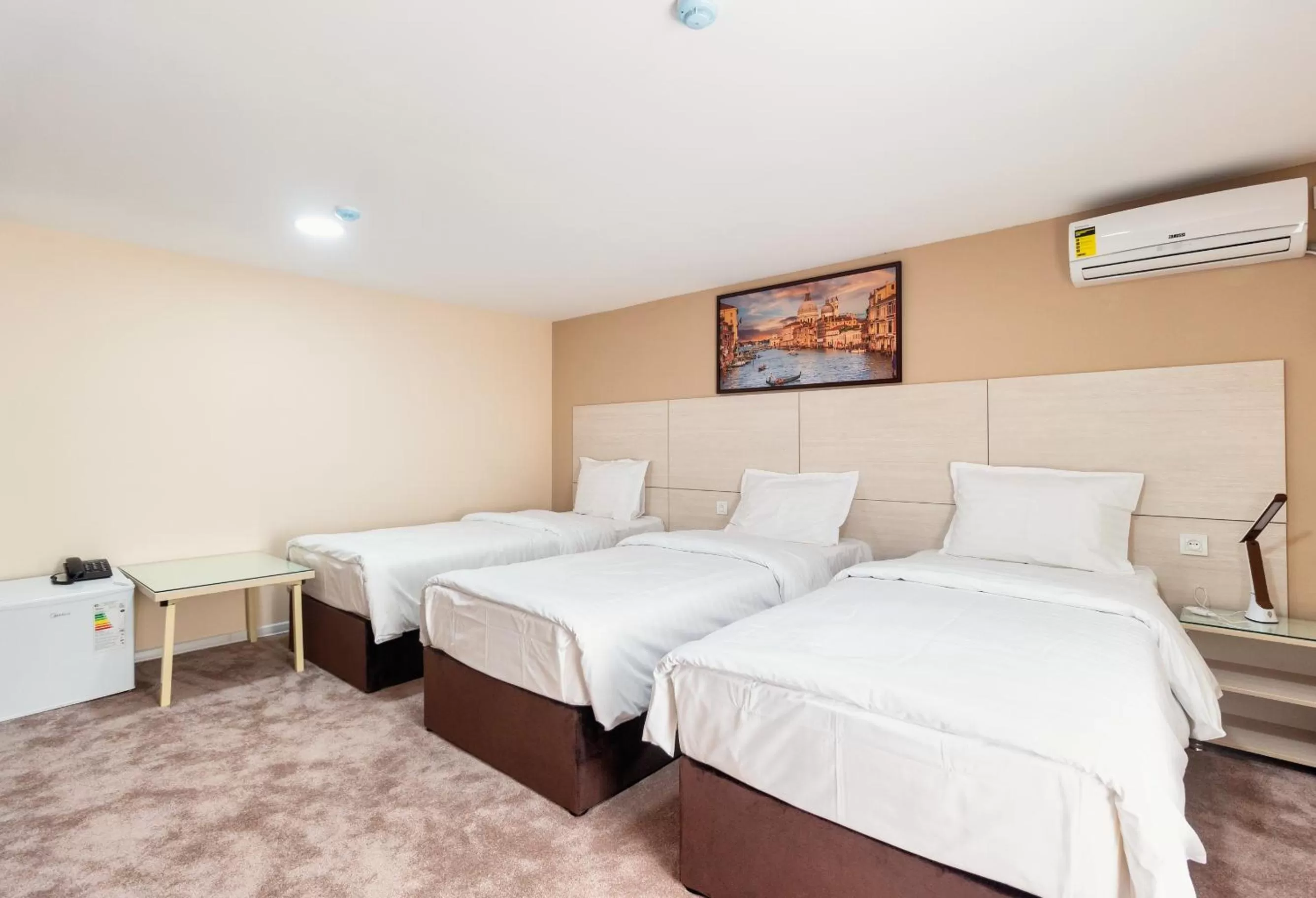 Bed in Musafir Hotel