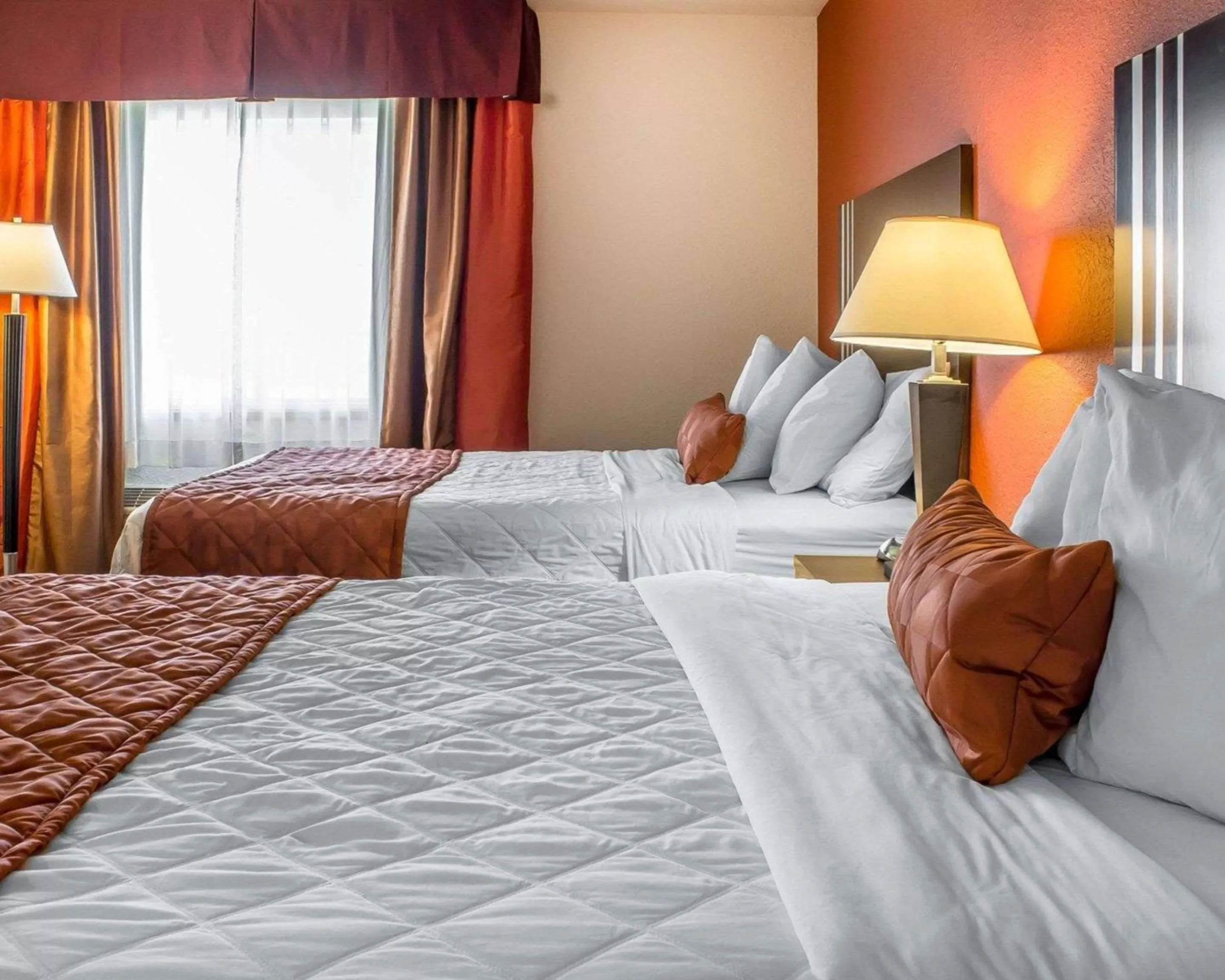 Photo of the whole room, Bed in Rodeway Inn & Suites near Okoboji Lake