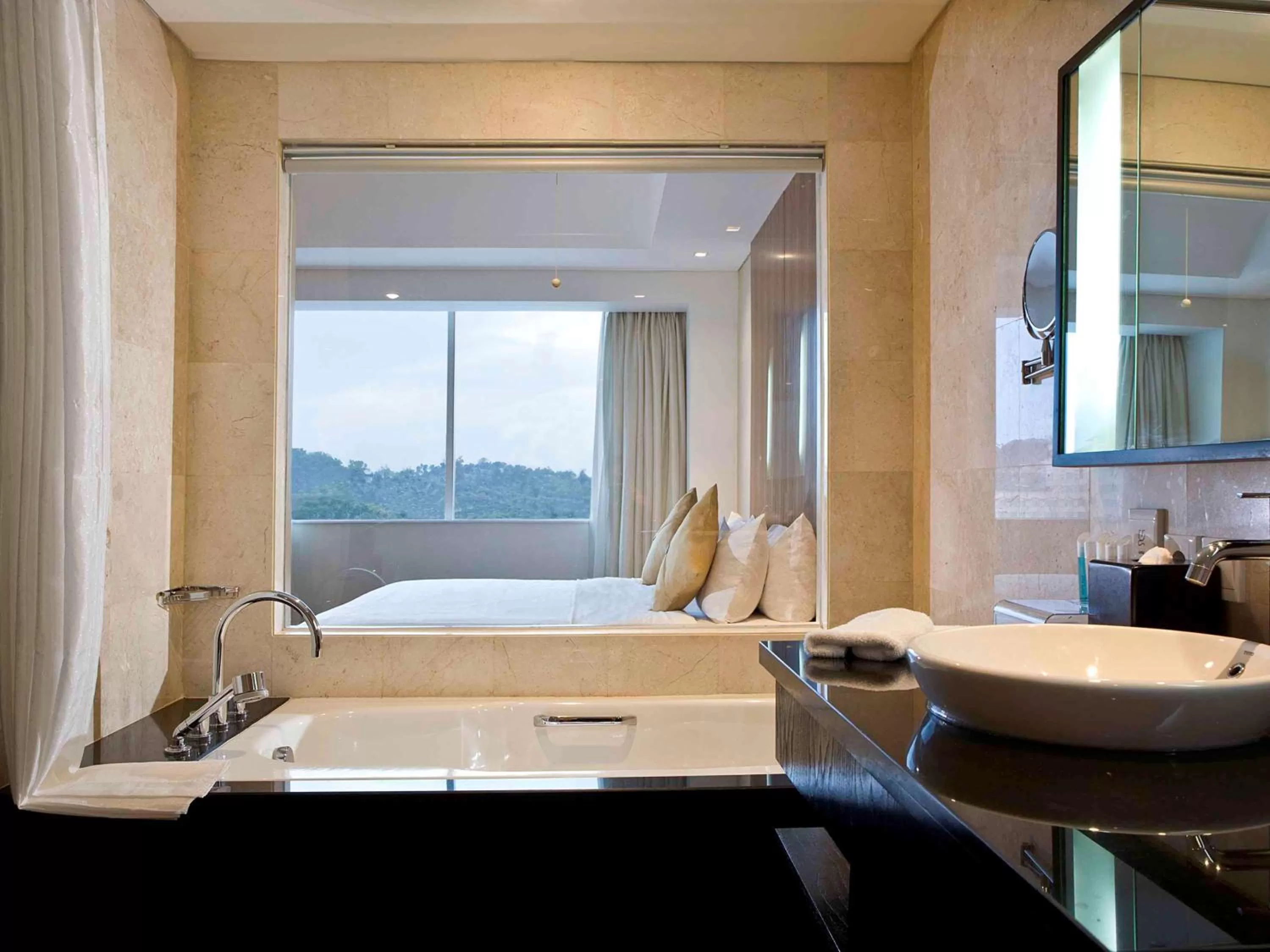 Photo of the whole room, Bed in Novotel Balikpapan