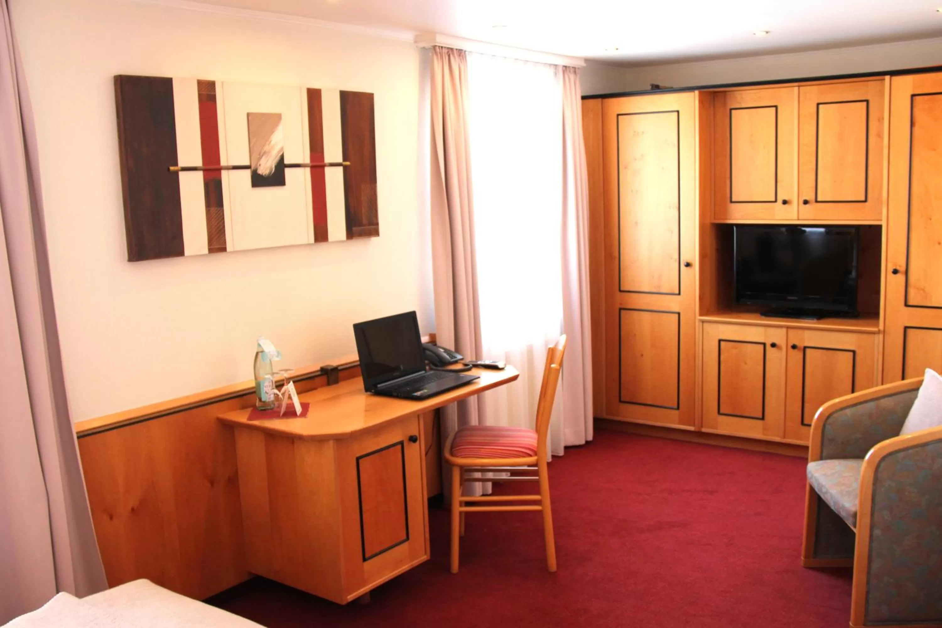 Photo of the whole room, TV/Entertainment Center in Hotel Riezler Hof