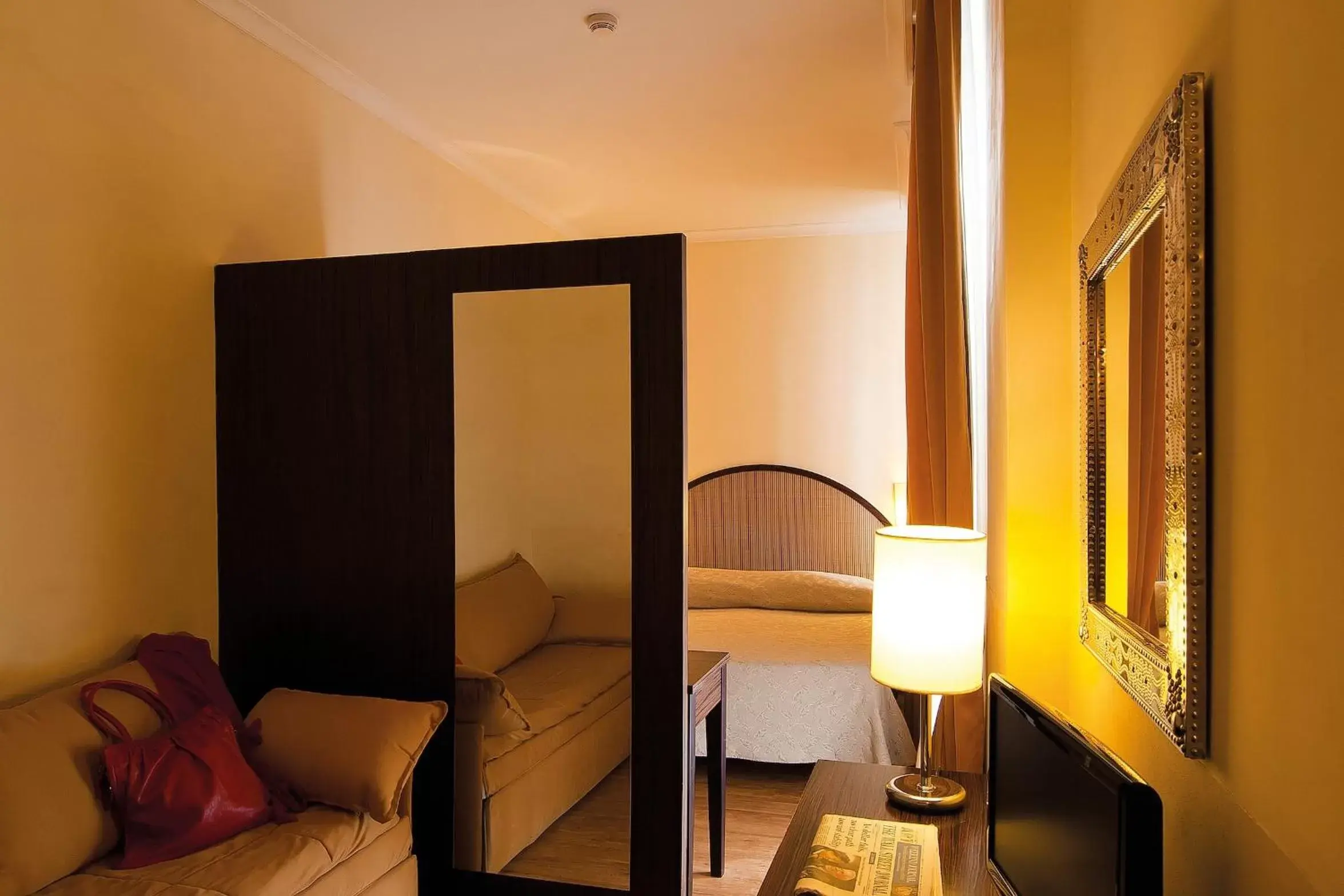 Deluxe Room in Hotel Novecento Deluxe Room in Hotel Novecento