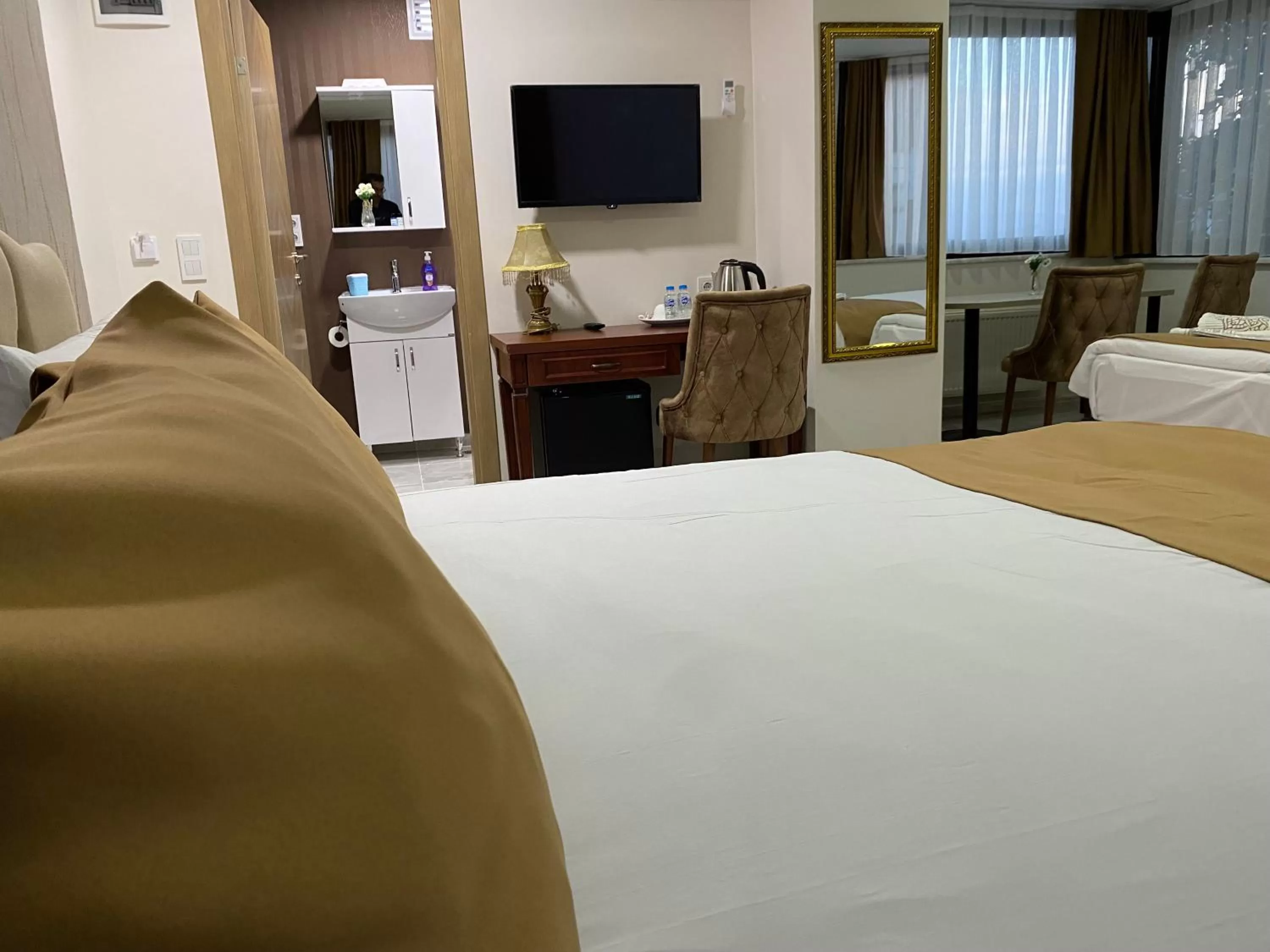 Photo of the whole room, Bed in Atam Suites