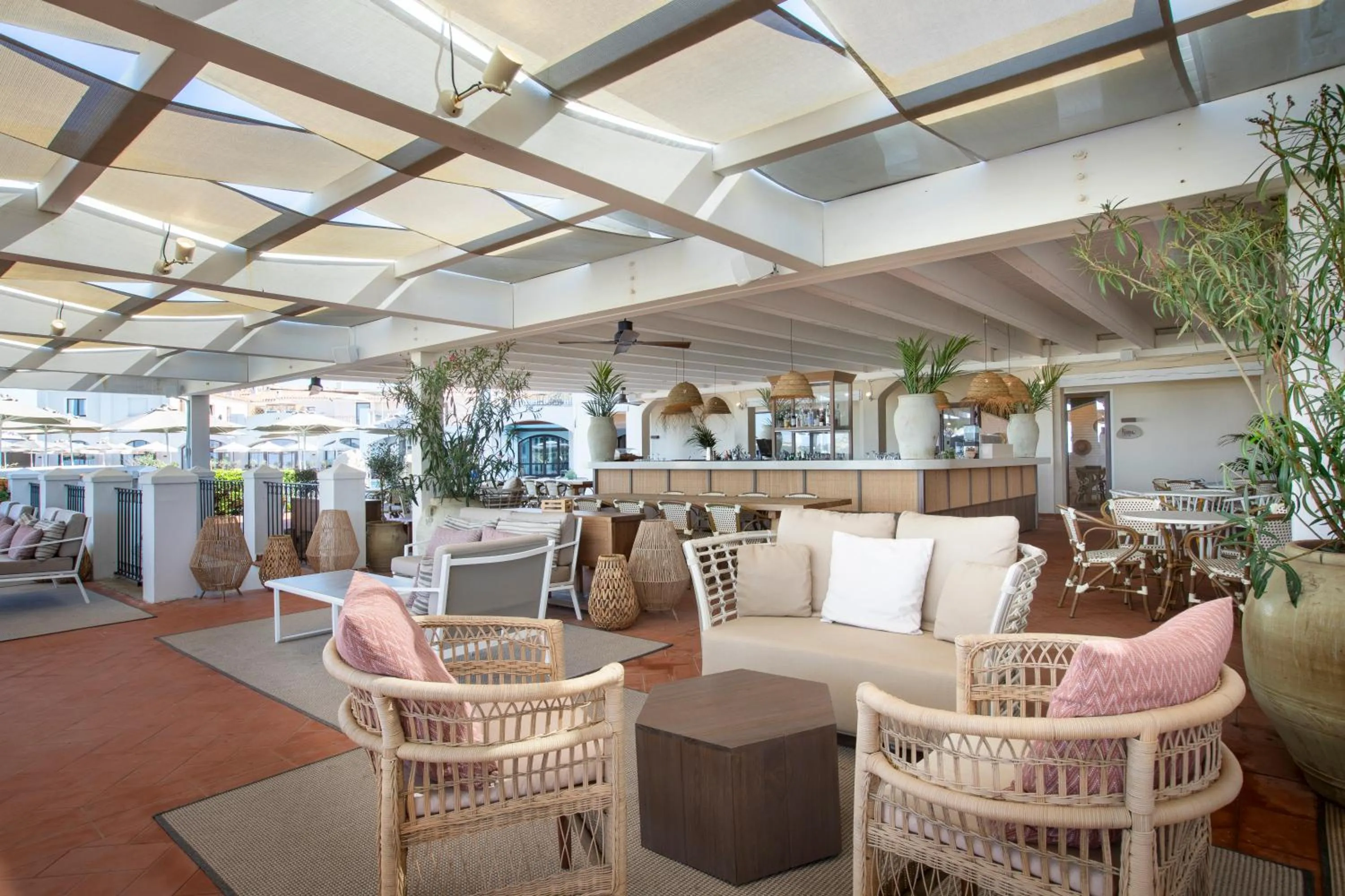 Lounge or bar in Mangia's Santa Teresa Sardinia, Curio Collection by Hilton