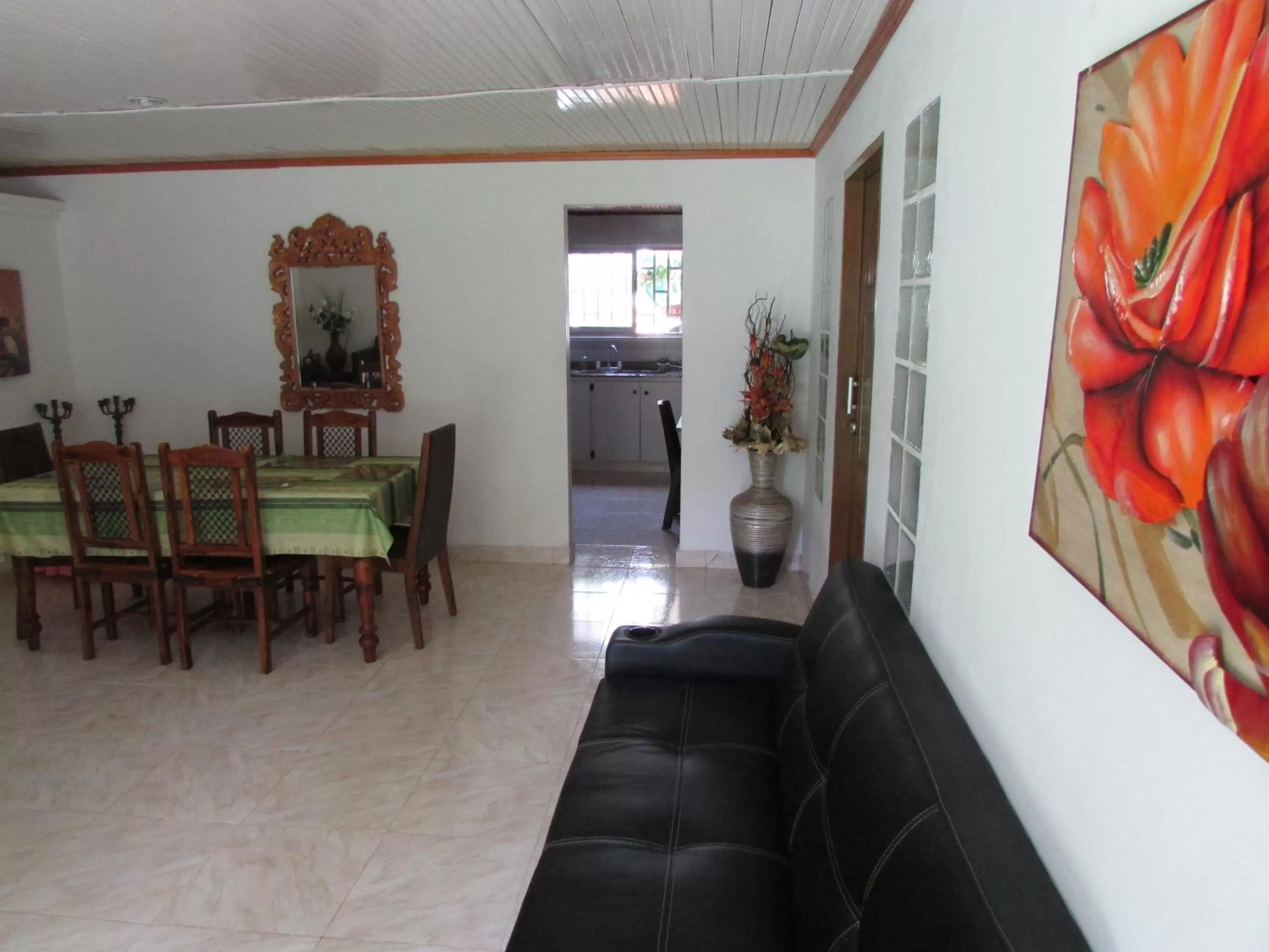 Communal lounge/ TV room, Lounge/Bar in Posada Hostal Miss Marlly