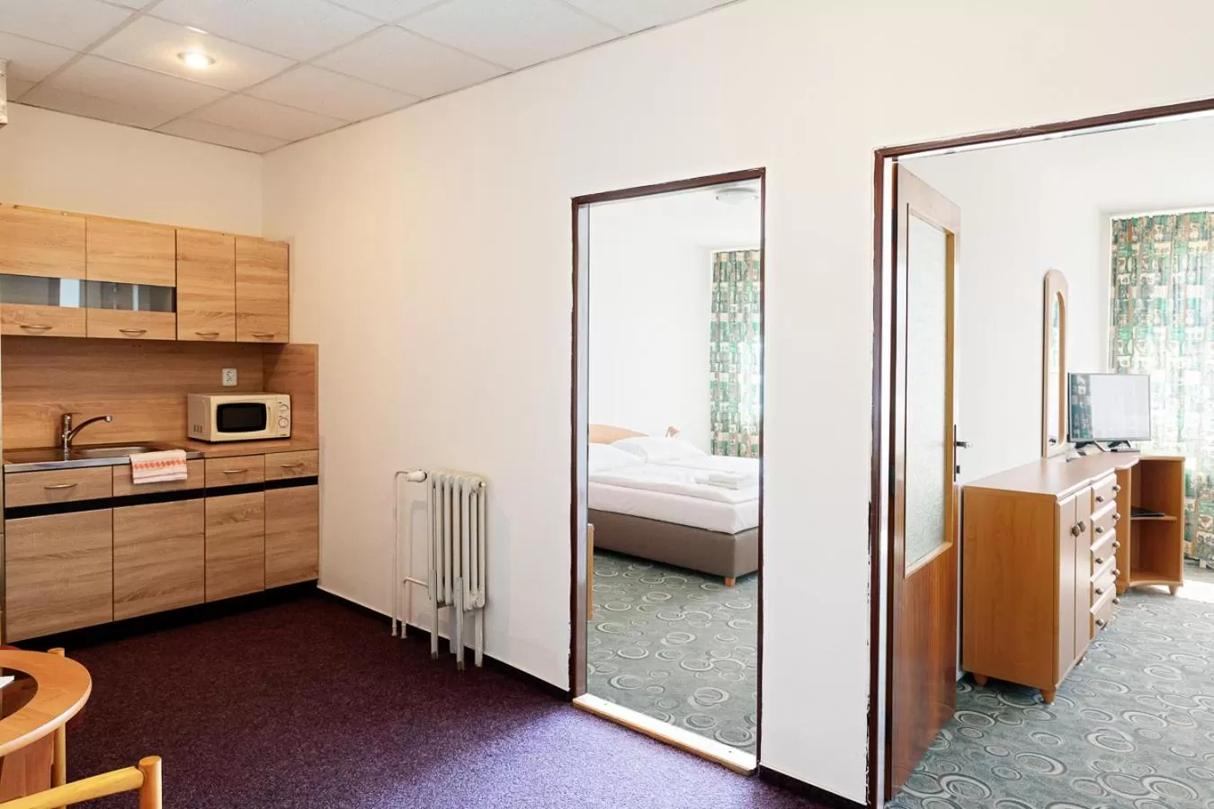 Kitchen or kitchenette, Bed in Hotel Slezan