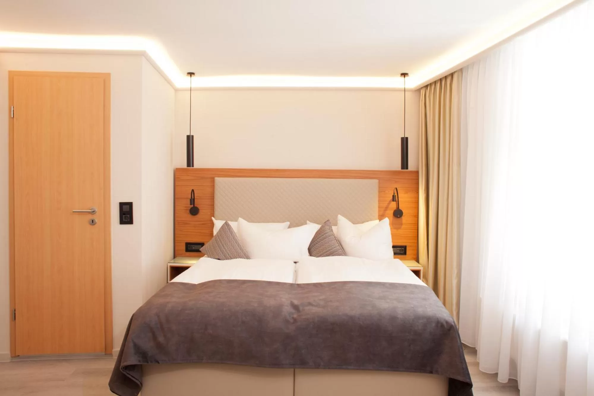 Bed in Hotel Schweriner Hof