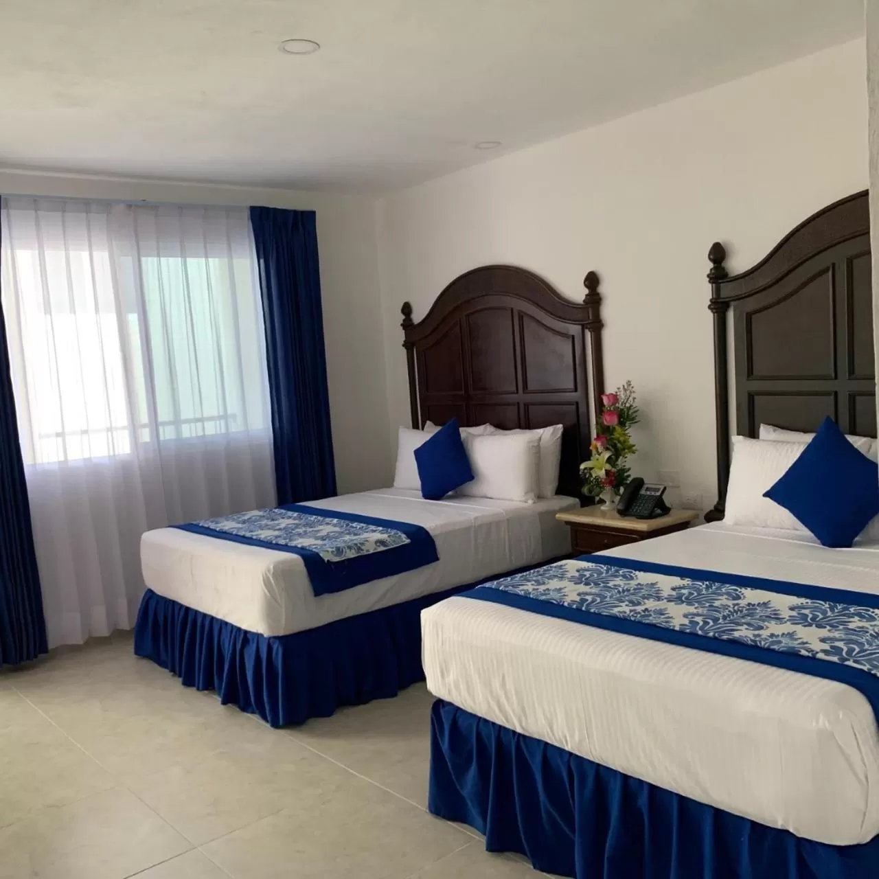 Bed in Hotel Catedral Valladolid Yucatan