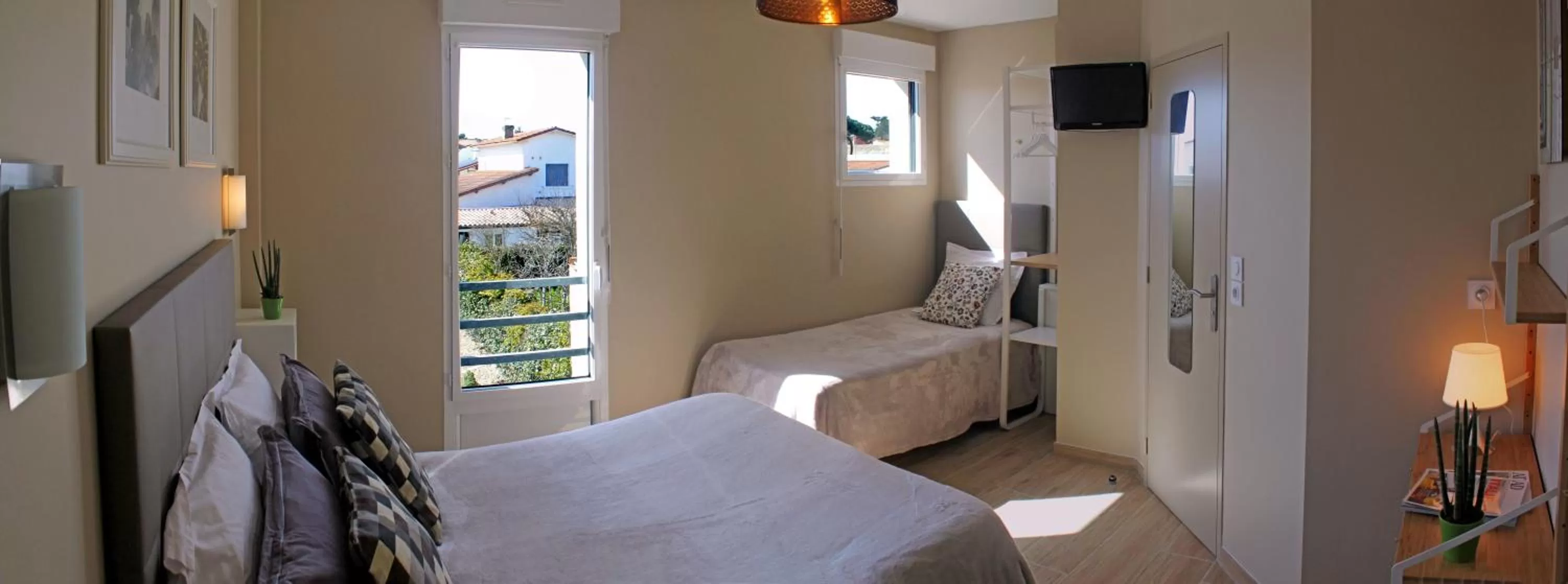 Photo of the whole room, Bed in Hôtel Le Printemps