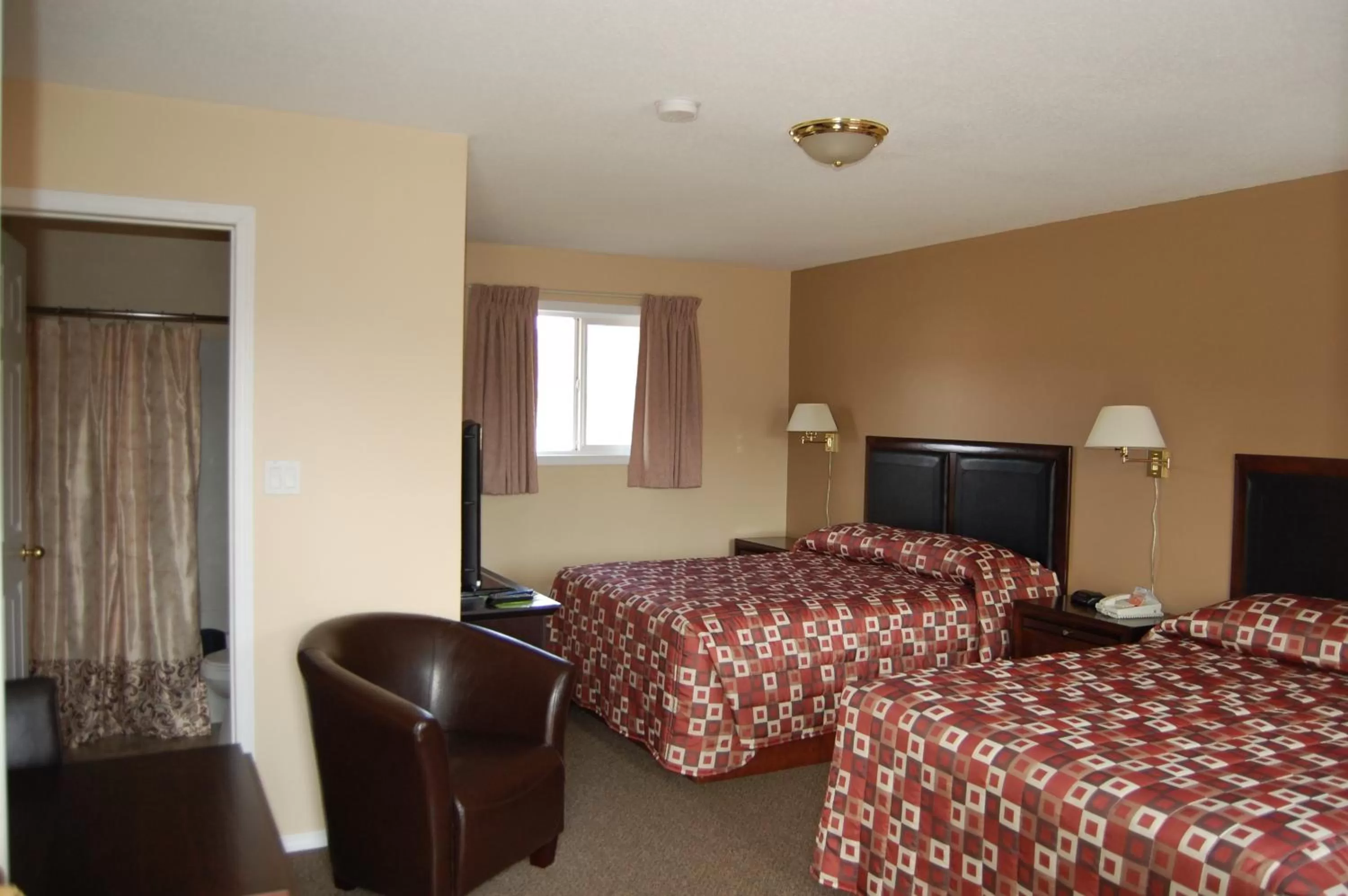 Bed in Monte Carlo Motel