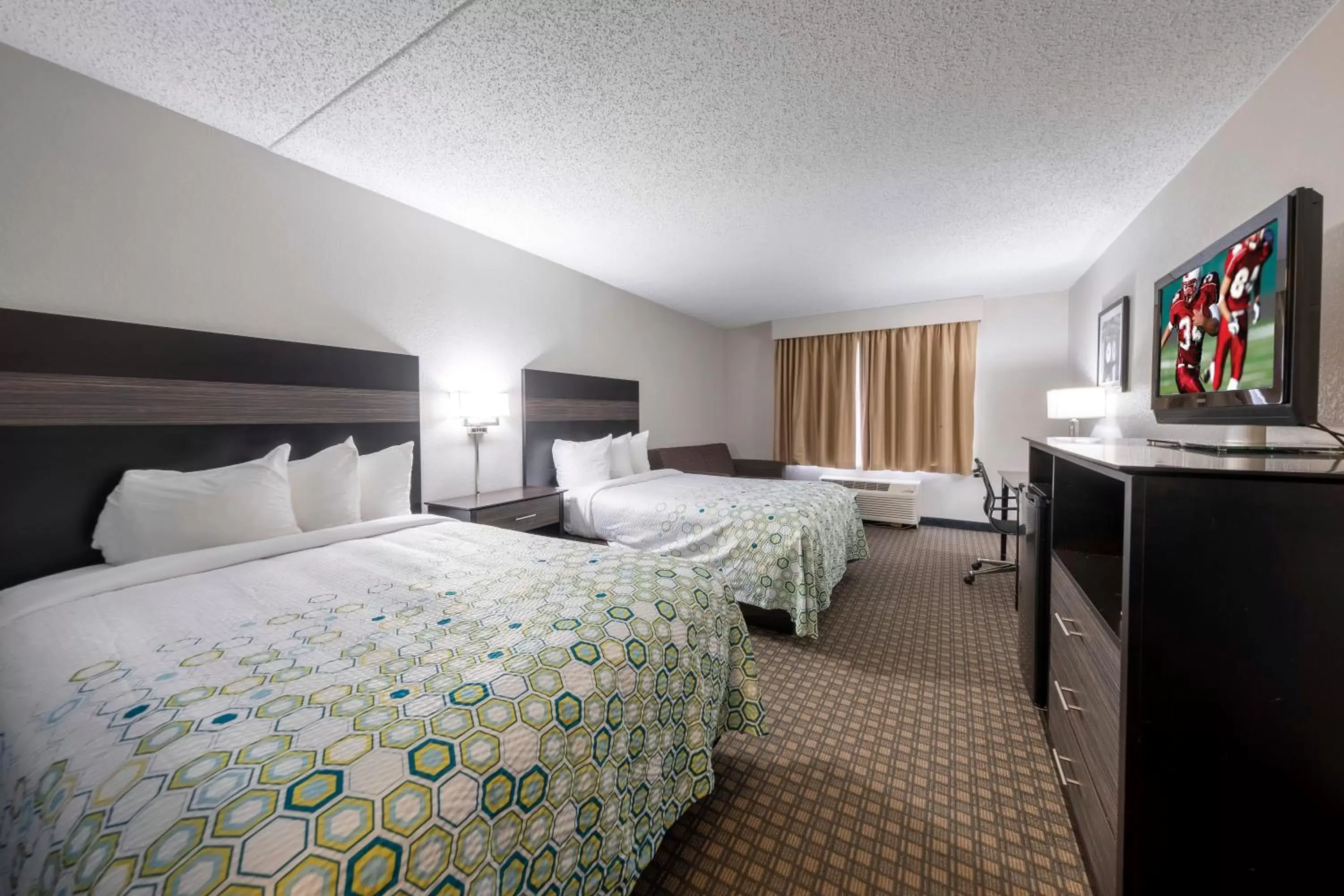 Standard Room with Two Double Beds with Sofa Bed, Microwave & Refrigerator Non-Smoking in HomeTown Inn by Red Roof East Syracuse Standard Room with Two Double Beds with Sofa Bed, Microwave & Refrigerator Non-Smoking in HomeTown Inn by Red Roof East Syracuse