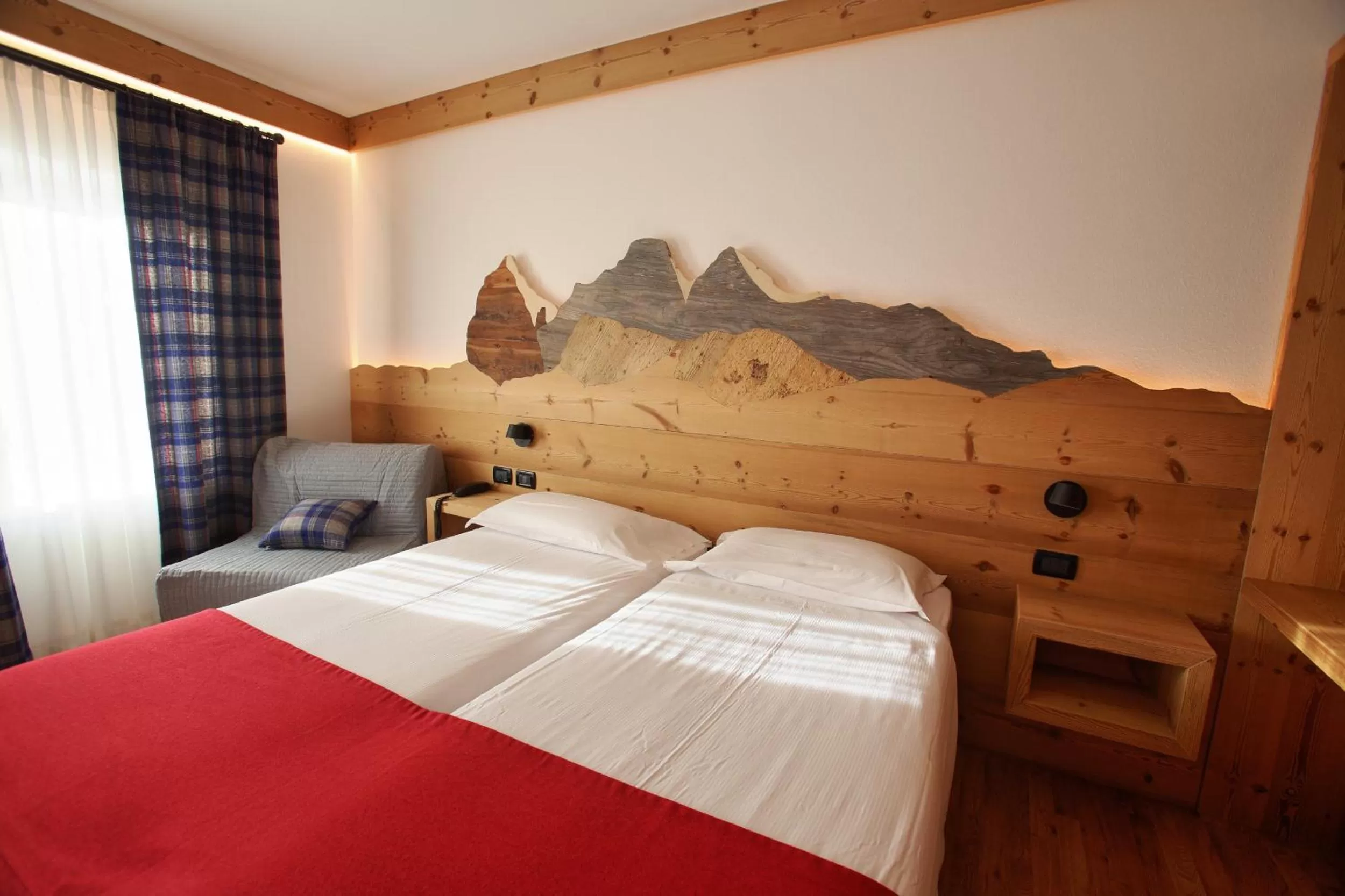 Bed in Hotel Des Alpes