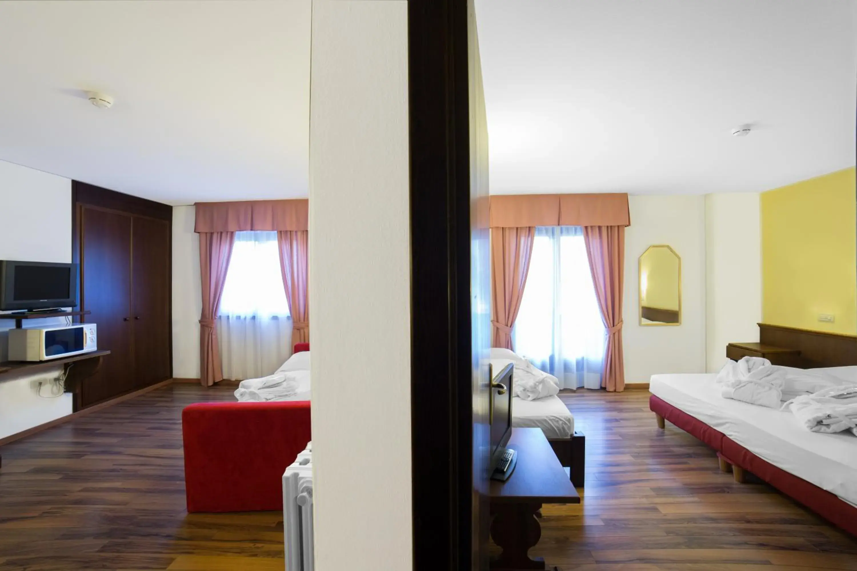 Family Room (3 Adults + 2 Children) in Hotel Baita Clementi Family Room (3 Adults + 2 Children) in Hotel Baita Clementi