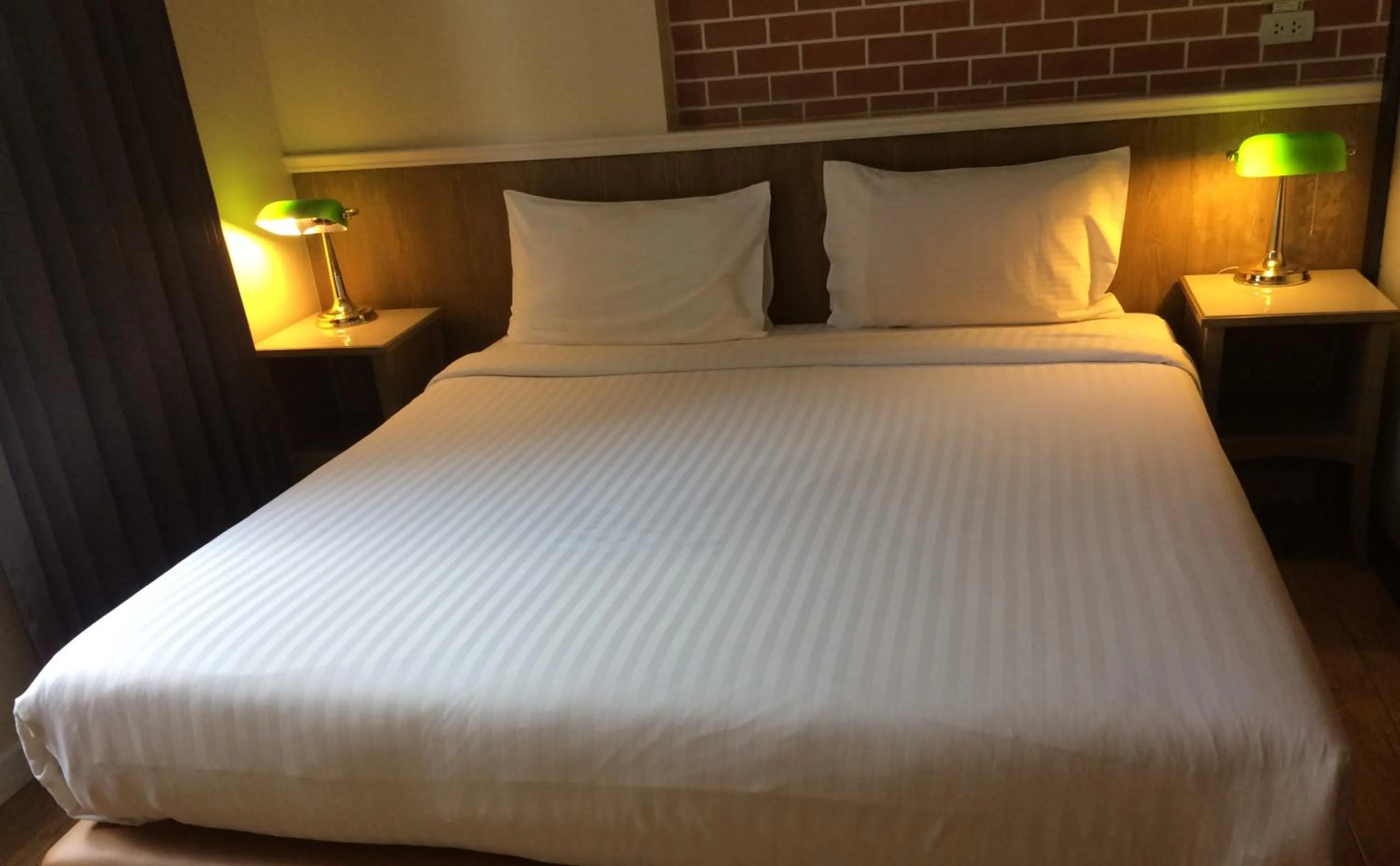 Bed in Bourbon St. Boutique Hotel