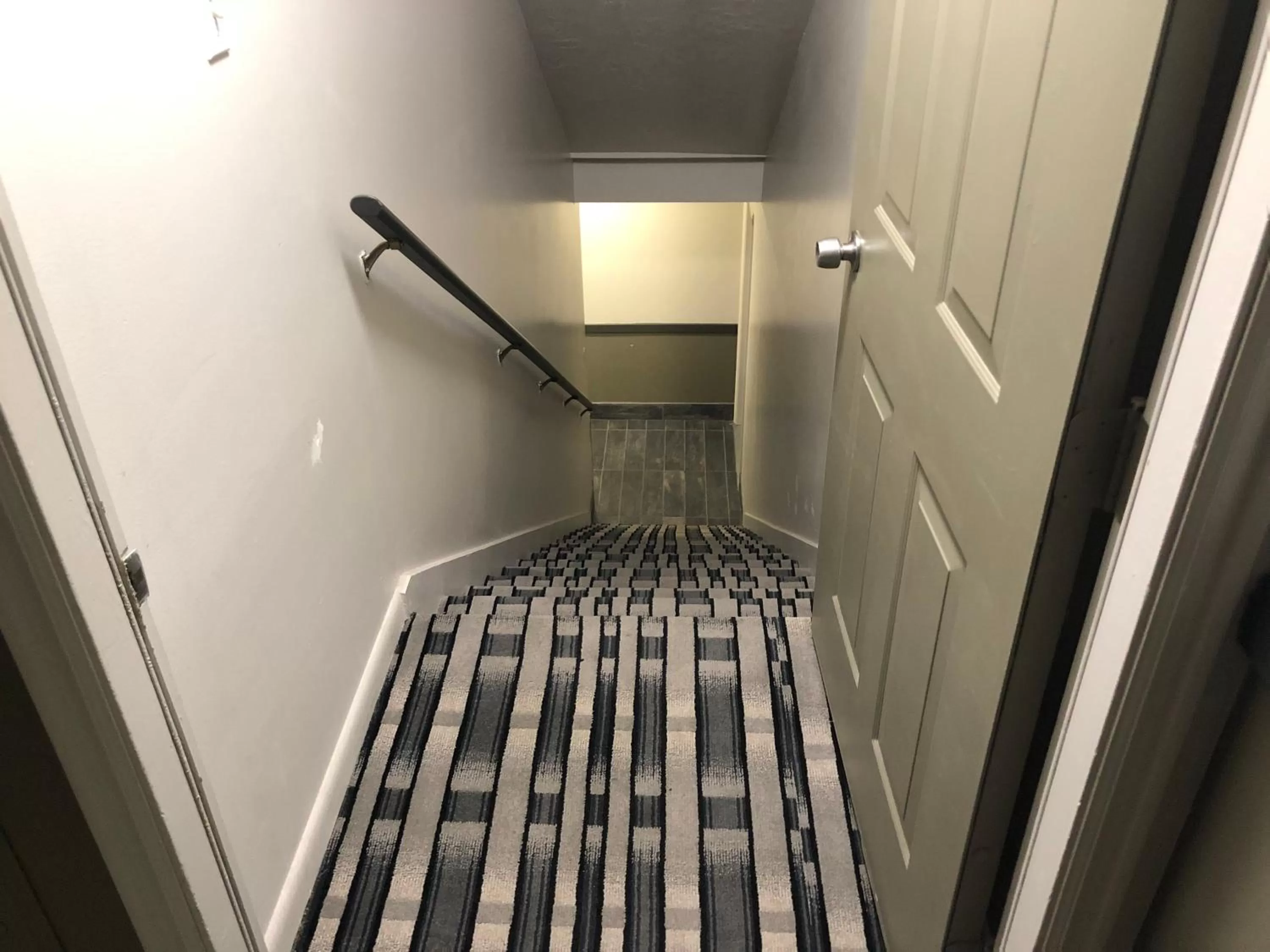 Bed in Ameri-Stay Inn & Suites