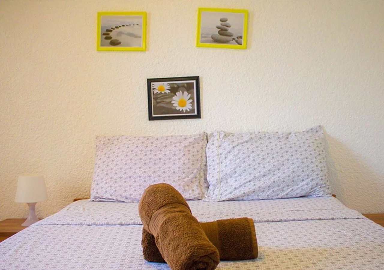 Bed in Jugalis Hotel and Restaurant