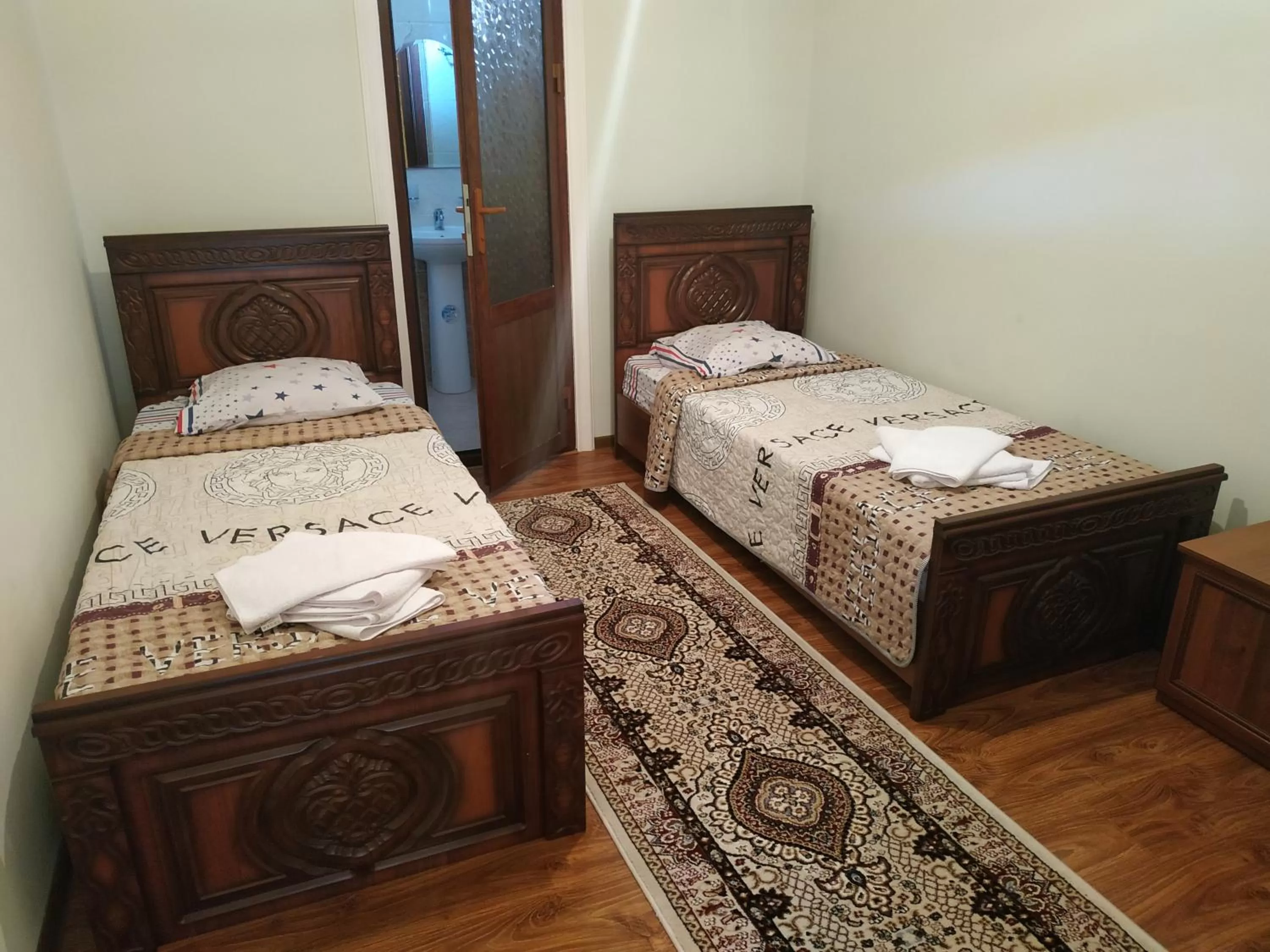 Bed in Tilyakori Hotel