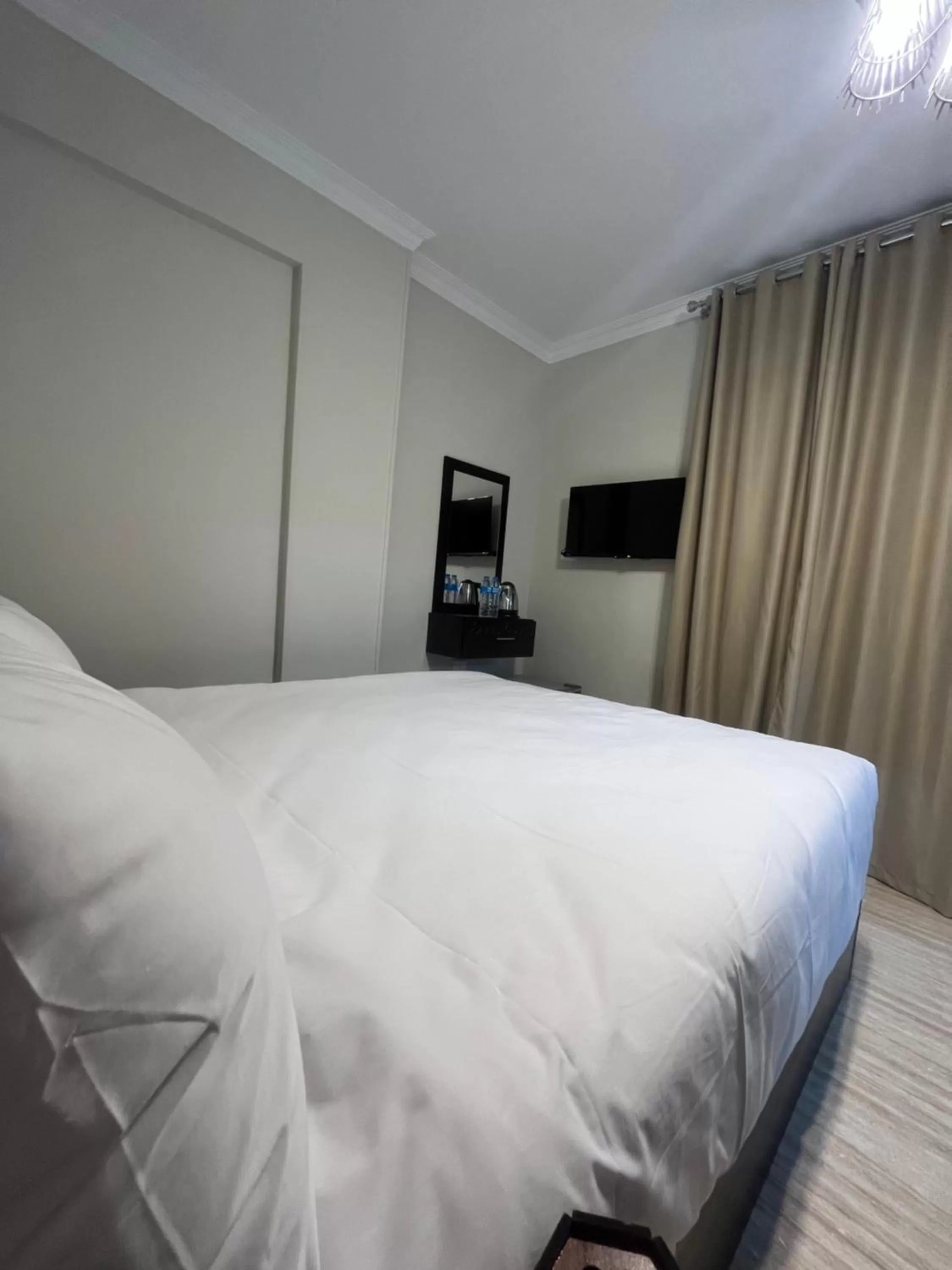 Bed in Crowne Pyramids view inn