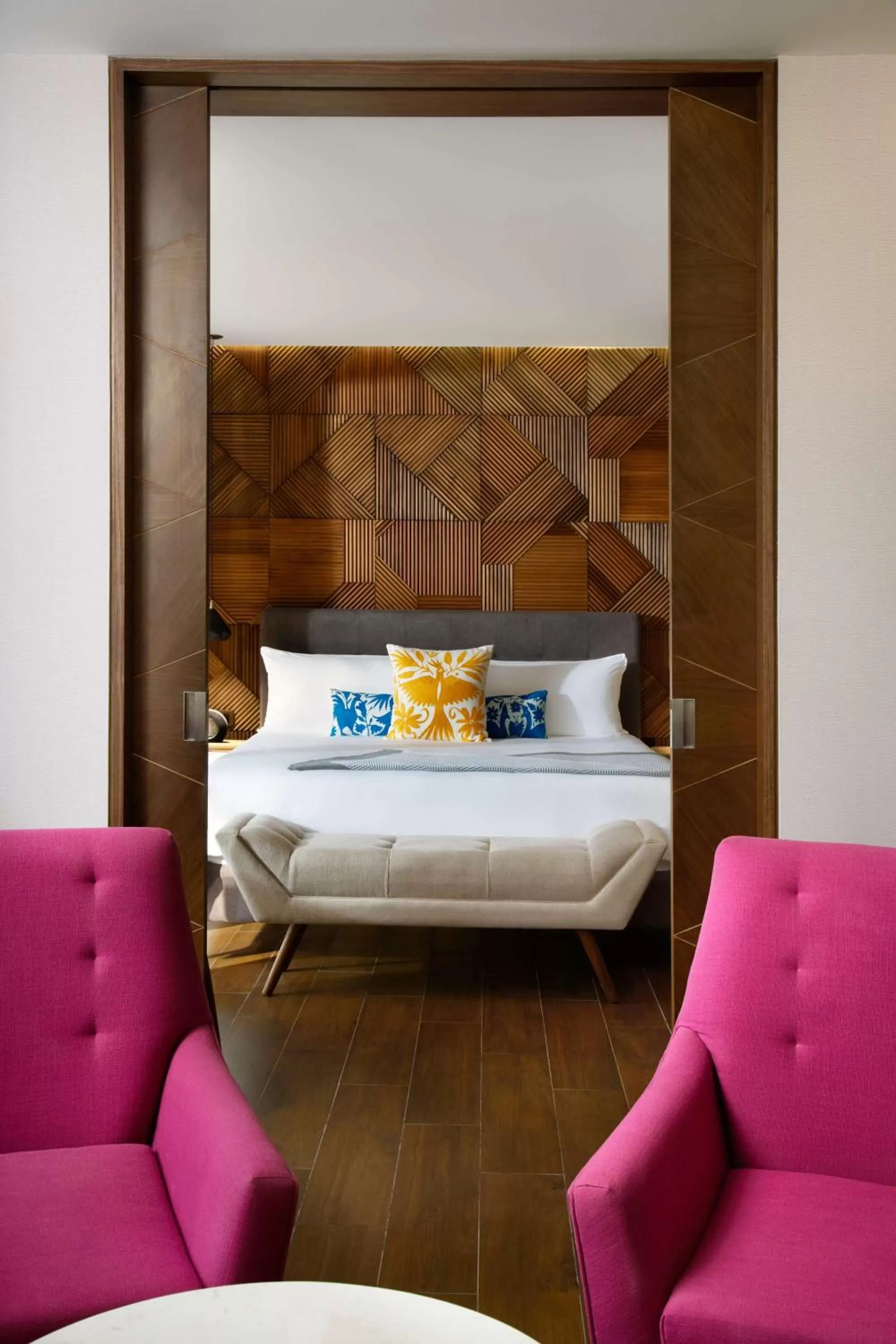 Living room in The Fives Downtown Hotel & Residences, Curio Collection by Hilton