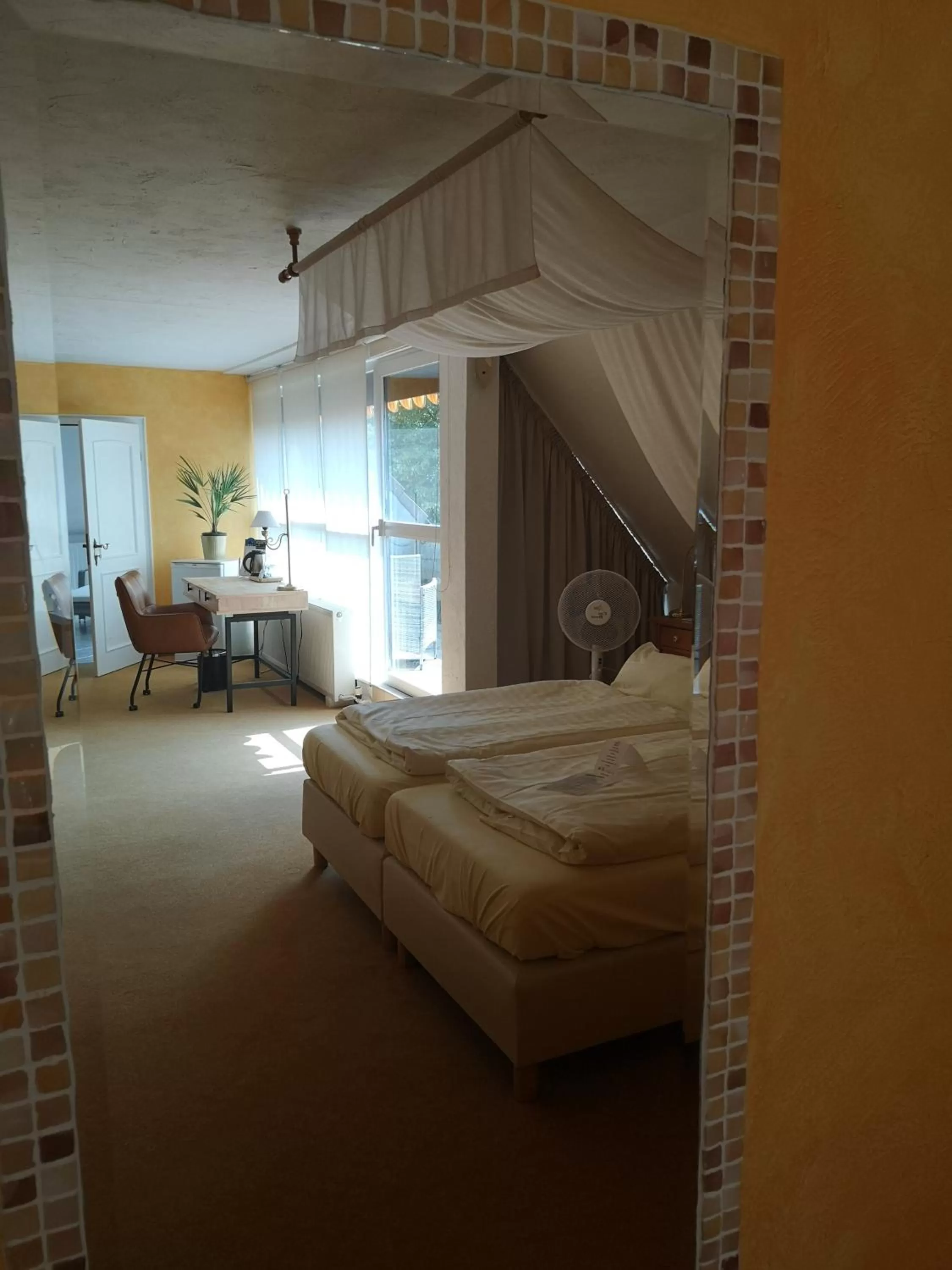 Photo of the whole room, Bed in Hotel Goldflair am Rathaus