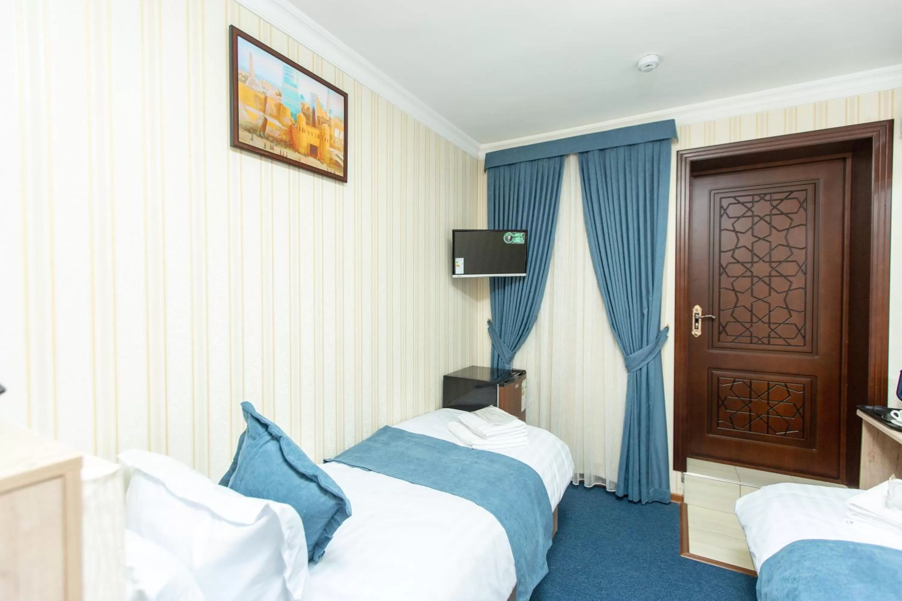 Bed in Mirzo Boutique Hotel