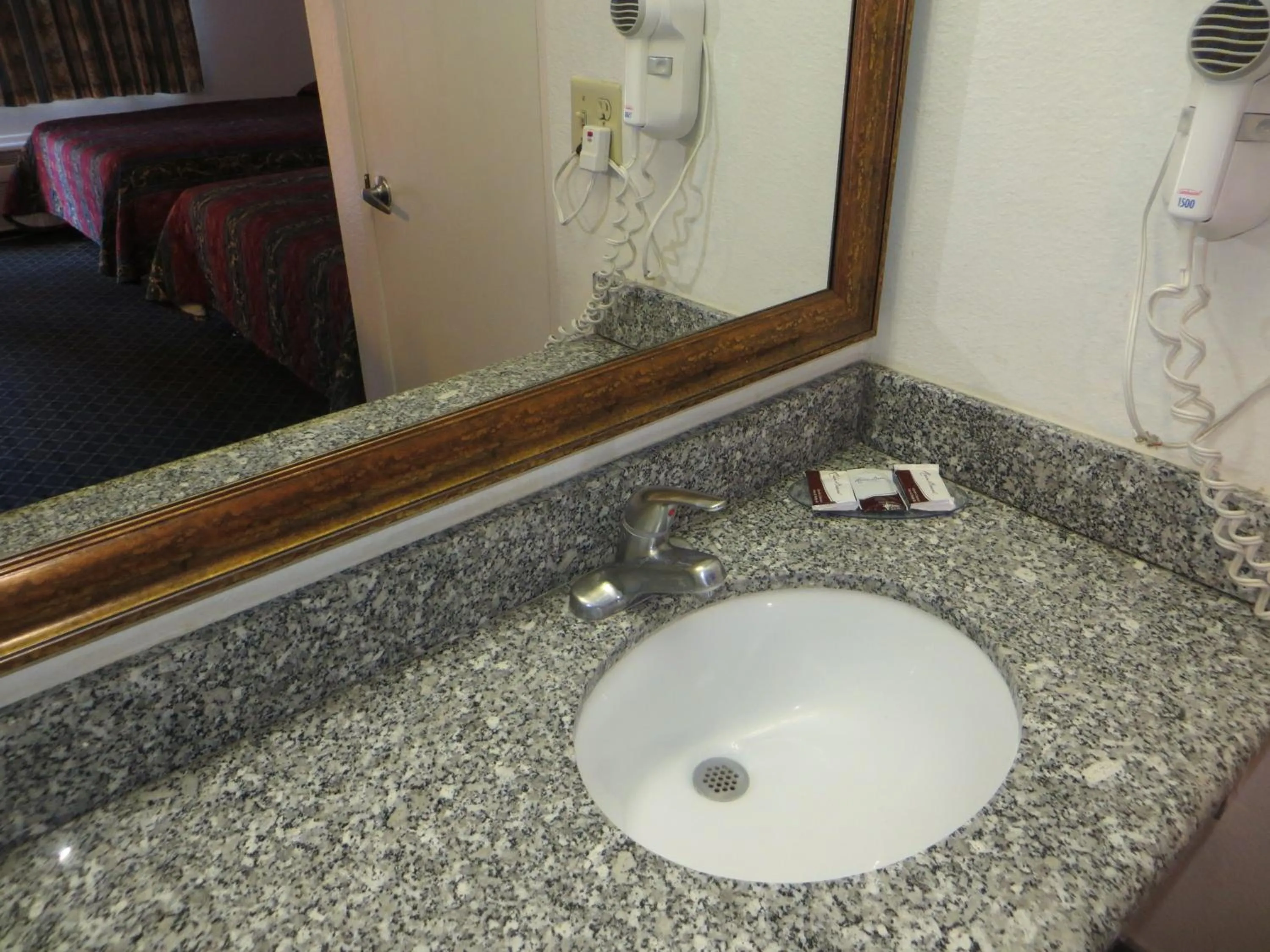 Bathroom in Riverside Inn & Suites