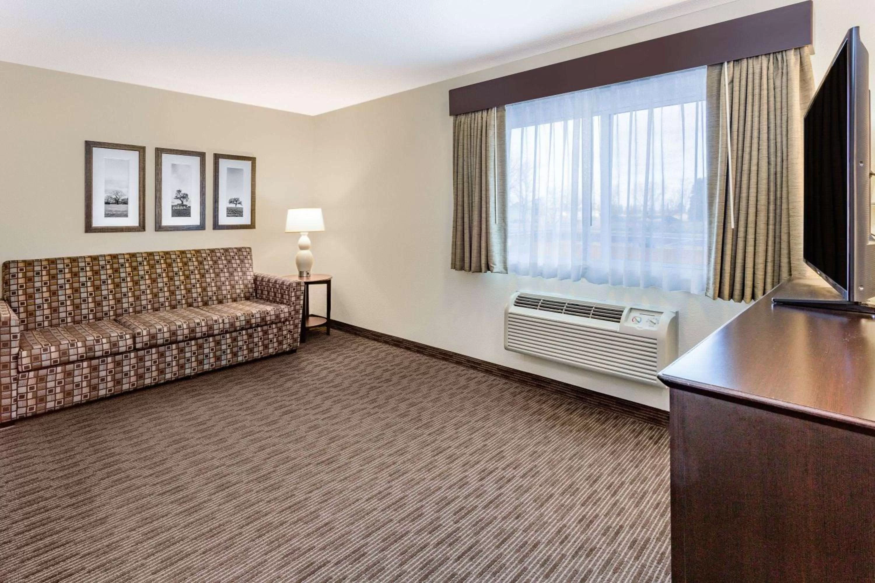 Living room in AmericInn by Wyndham Sleepy Eye