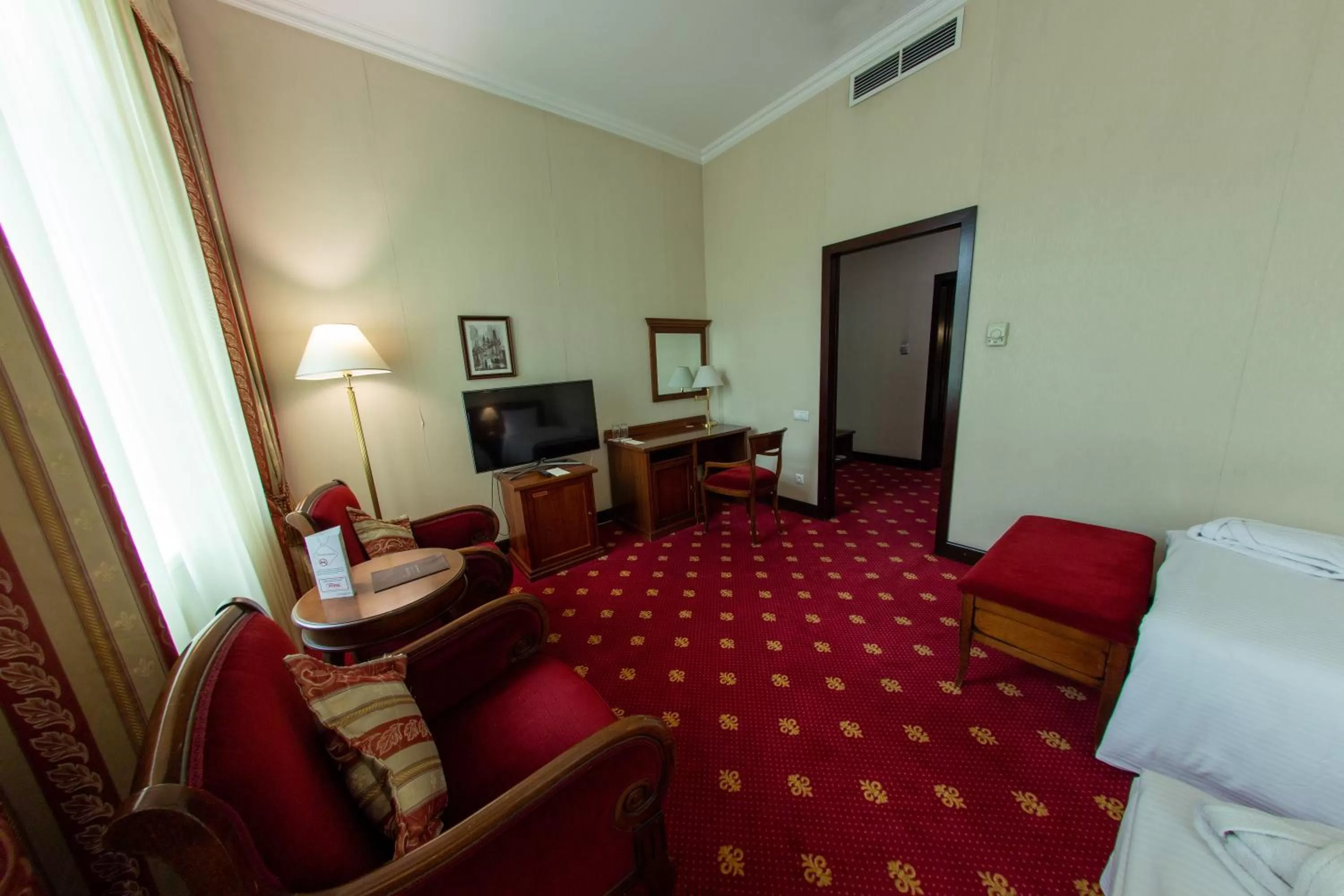 Bed in Grand Tien Shan Hotel