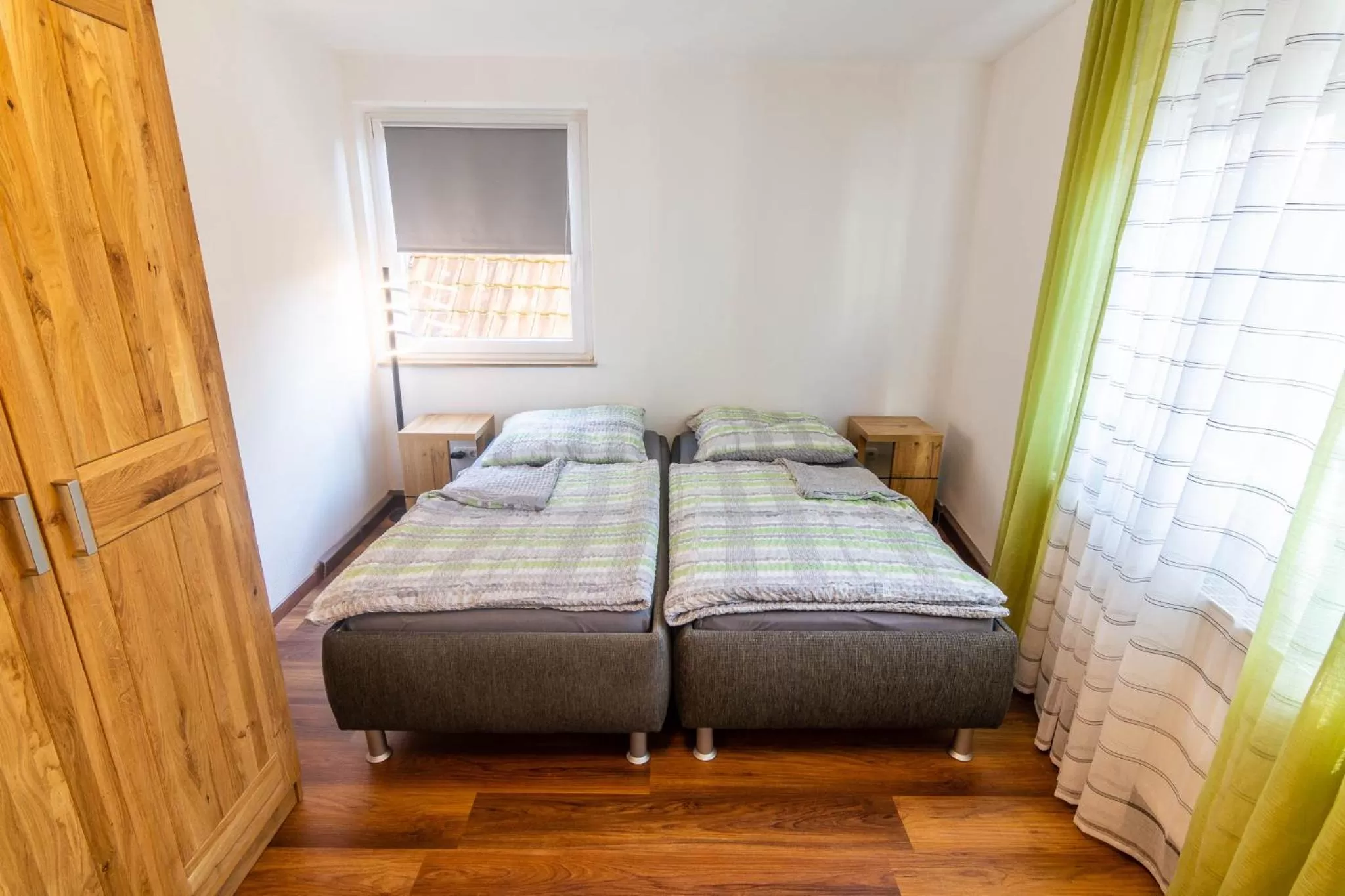 Living room, Bed in Gästehaus Jagsttal