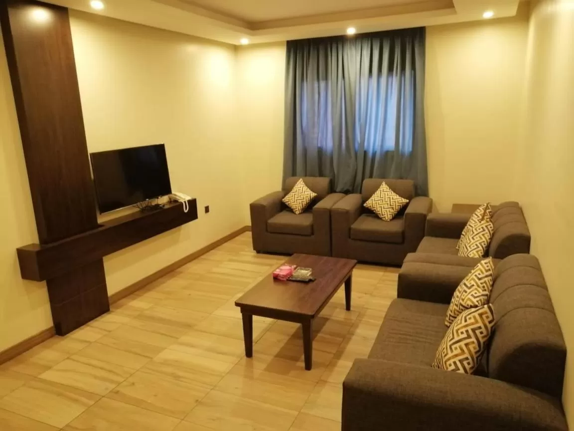 Communal lounge/ TV room, Seating Area in Drr Ramah Hotel Apartments 10