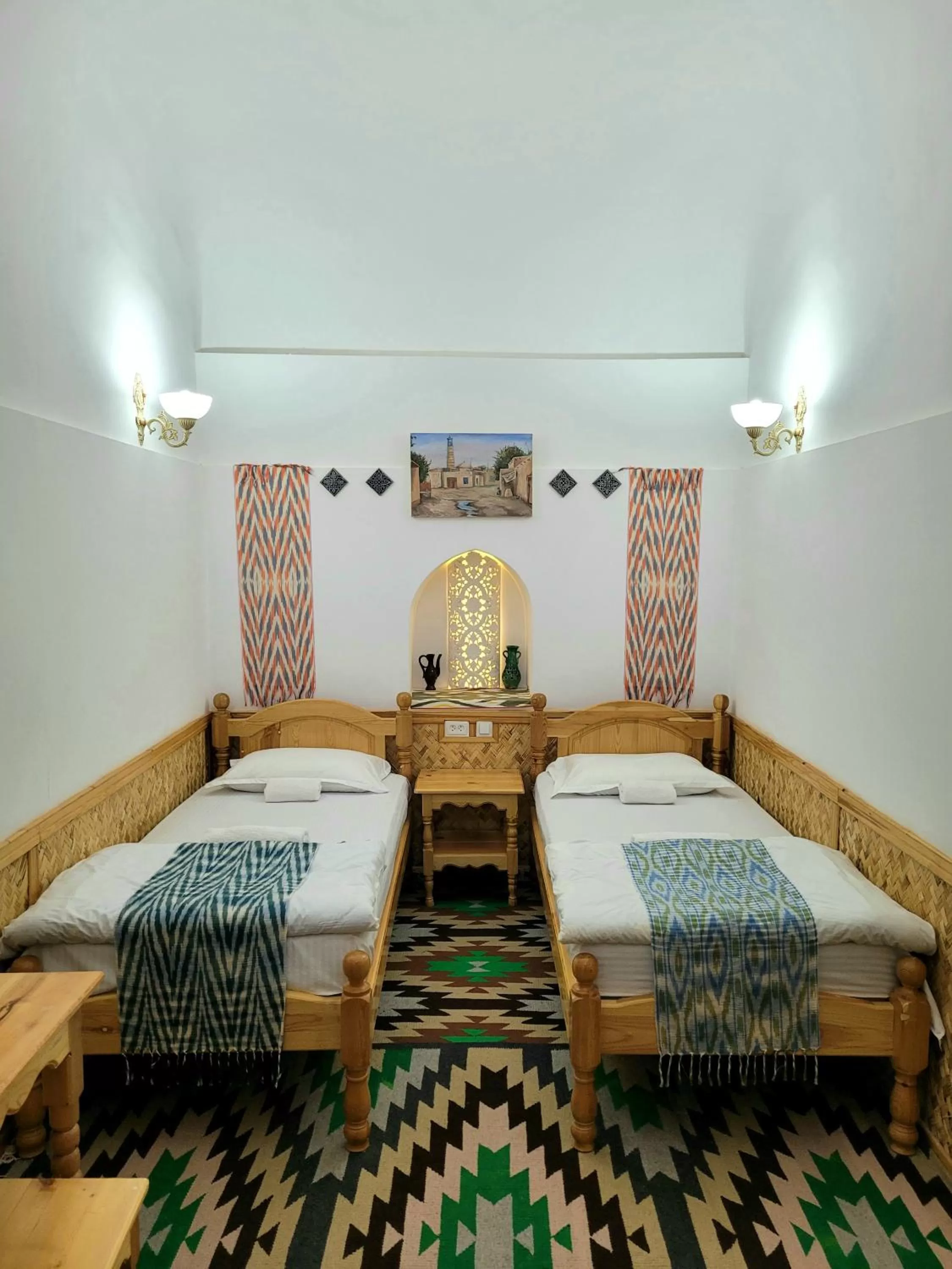 Photo of the whole room, Bed in madrasah Polvon-Qori boutique hotel