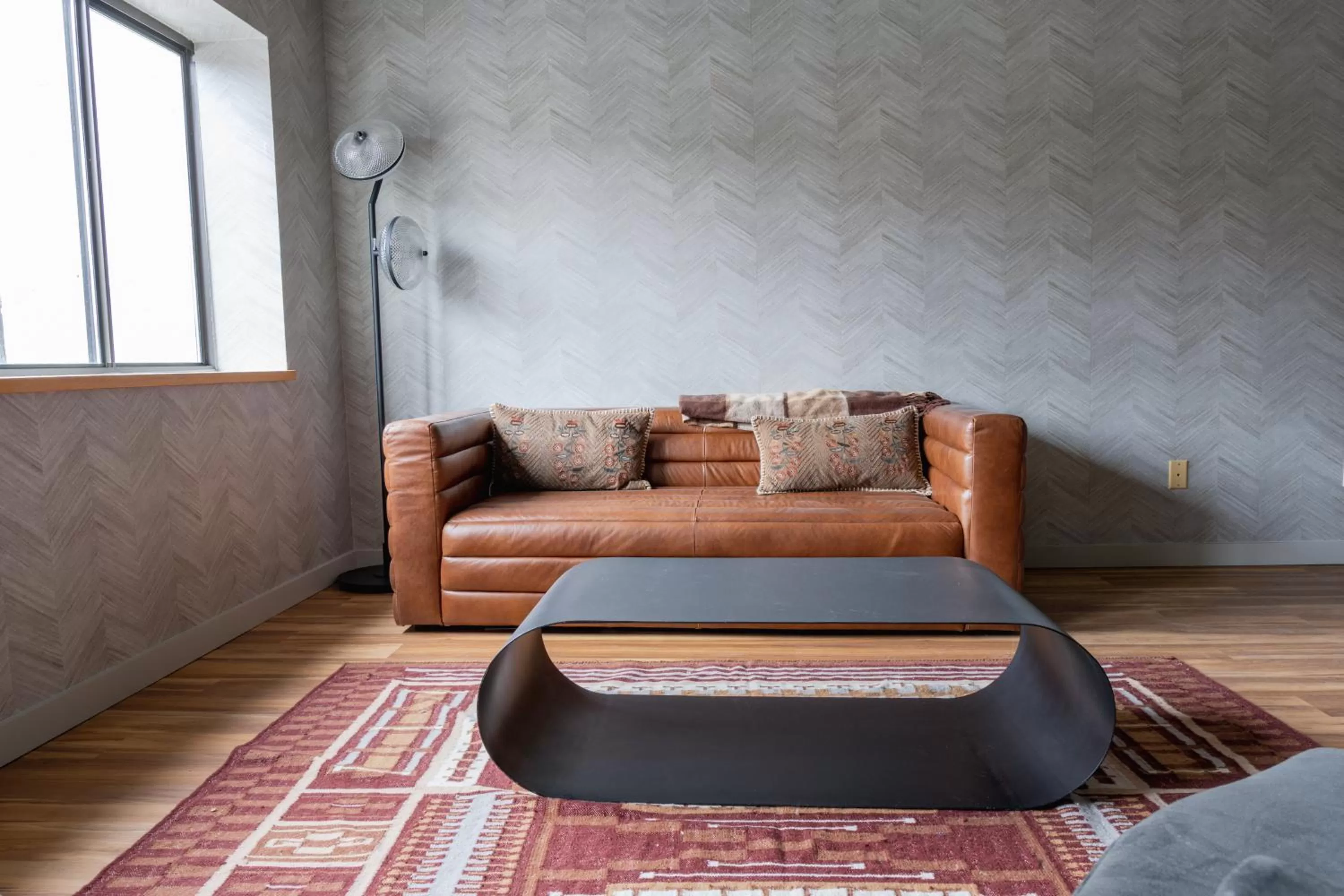 Seating area in Hunter Lodge, a Bluebird by Lark